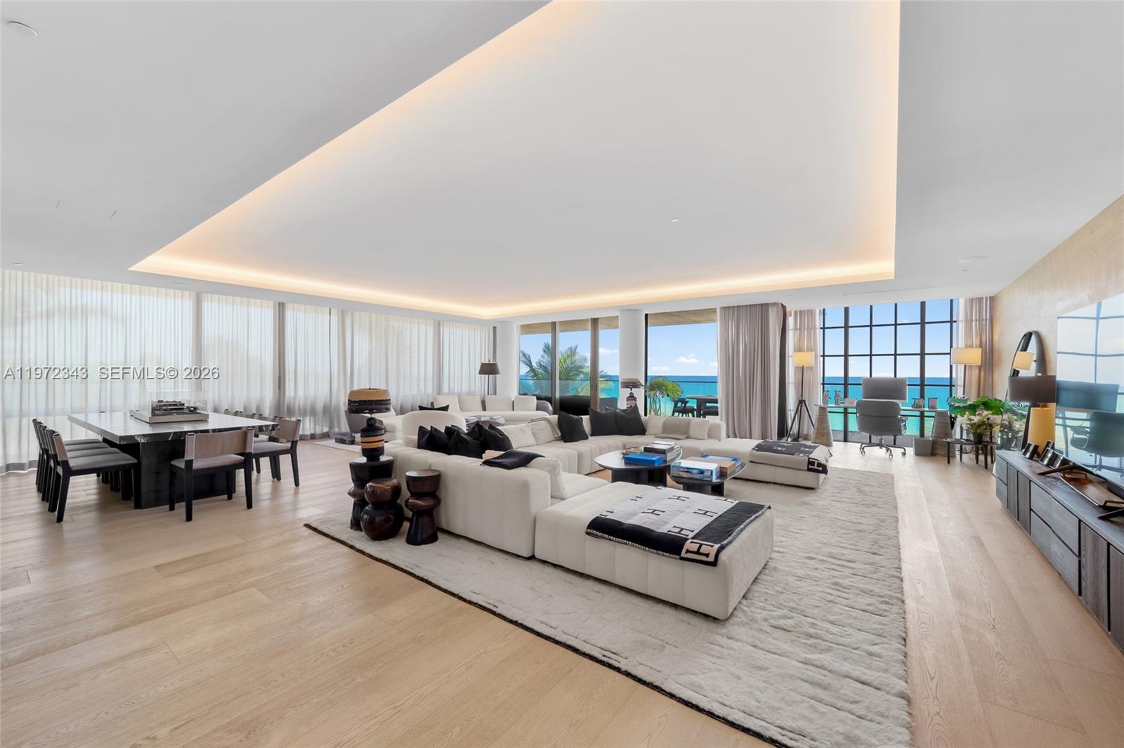 An extraordinary statement in ultra-luxury oceanfront living, this 5,200 SF residence at ARTE Surfside sets a new benchmark for privacy, scale, and architectural integrity. Designed by Antonio Citterio, this four-bedroom, four-and-a-half-bath home features grand proportions, soaring ceilings, and sweeping Atlantic views framed by floor-to-ceiling Schüco impact-rated glass.

Created for refined living and effortless entertaining, the bespoke Poliform kitchen is equipped with top-tier Gaggenau appliances, including gas cooking, custom cabinetry, and striking marble surfaces. Clean lines and curated finishes define a sophisticated, modern coastal aesthetic.

The expansive primary suite offers a true retreat with natural stone bath elements, soaking tub, oversized shower, and generous custom closets. Each additional bedroom is privately positioned with en-suite baths.

Seamless indoor-outdoor living flows to a generous oceanfront terrace ideal for hosting or relaxing in total serenity. This ultra-boutique building of just 16 residences is known for exceptional privacy, best-in-class security, and true white-glove service. Amenities include a rooftop tennis court with AC lounge, media room, full kitchen and fridge—arguably the finest private tennis facility anywhere—plus indoor and outdoor lap pools, full wellness spa, state-of-the-art fitness center, private air-conditioned garages, concierge, valet, and 24-hour security.