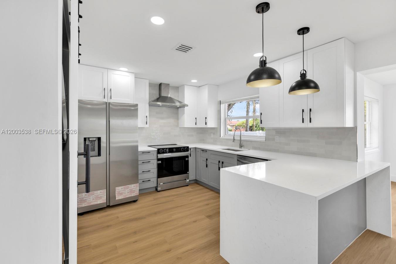 Beautifully renovated home in Dania Beach! This 3BR/3BA property features 2 en-suite bedrooms and sits on a generous 8,720 sq ft lot. Recently updated with brand-new electrical, plumbing, and a new A/C installed last month. All renovations were completed with permits and have been fully approved by the City of Dania Beach. Impact windows throughout, modern finishes, and thoughtful design make this home stand out in the area. Large backyard with room for a pool, perfect for entertaining or family gatherings. Move-in ready and centrally located near beaches, highways, and shopping. A rare opportunity!