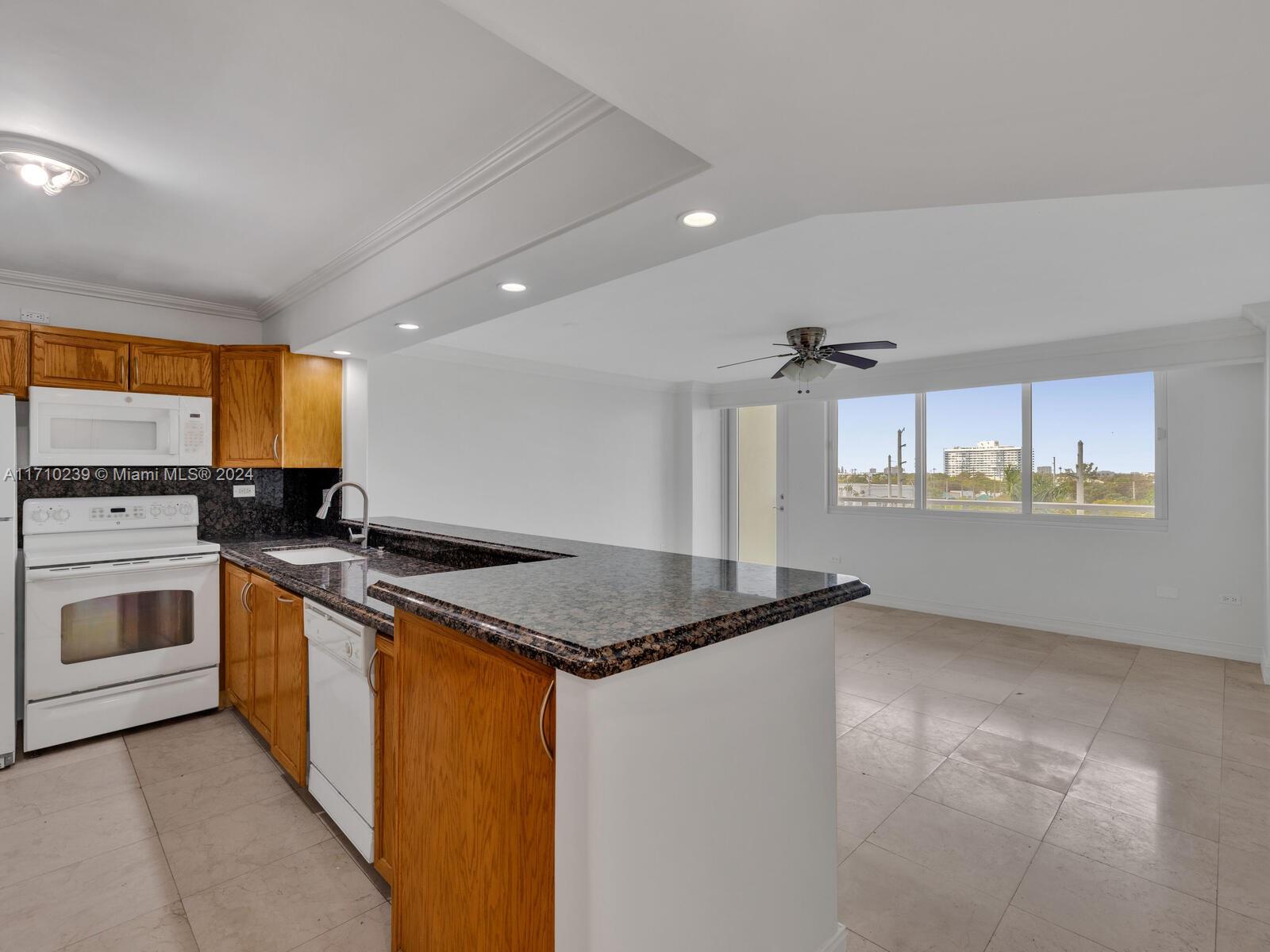 Welcome to The Skyline Flat at Burleigh House! This spacious and bright 1-bedroom/2-bathroom condo features new hurricane impact windows and doors, gorgeous and neutral tile floors throughout, and a roomy open kitchen with breakfast bar and washer-dryer combo. The large bedroom boasts double closets, while both bathrooms offer granite countertops and great storage. Enjoy breathtaking city and sunset views from the spacious balcony, and relax by the newly remodeled pool and sundeck overlooking the beach. Other amenities include a large remodeled gym, several social rooms, and excellent on-site security. You’ll also enjoy easy access to plenty of North Beach hotspot dining and shopping options. Complete with a new A/C, this unit is perfect for those seeking style, comfort, and convenience.