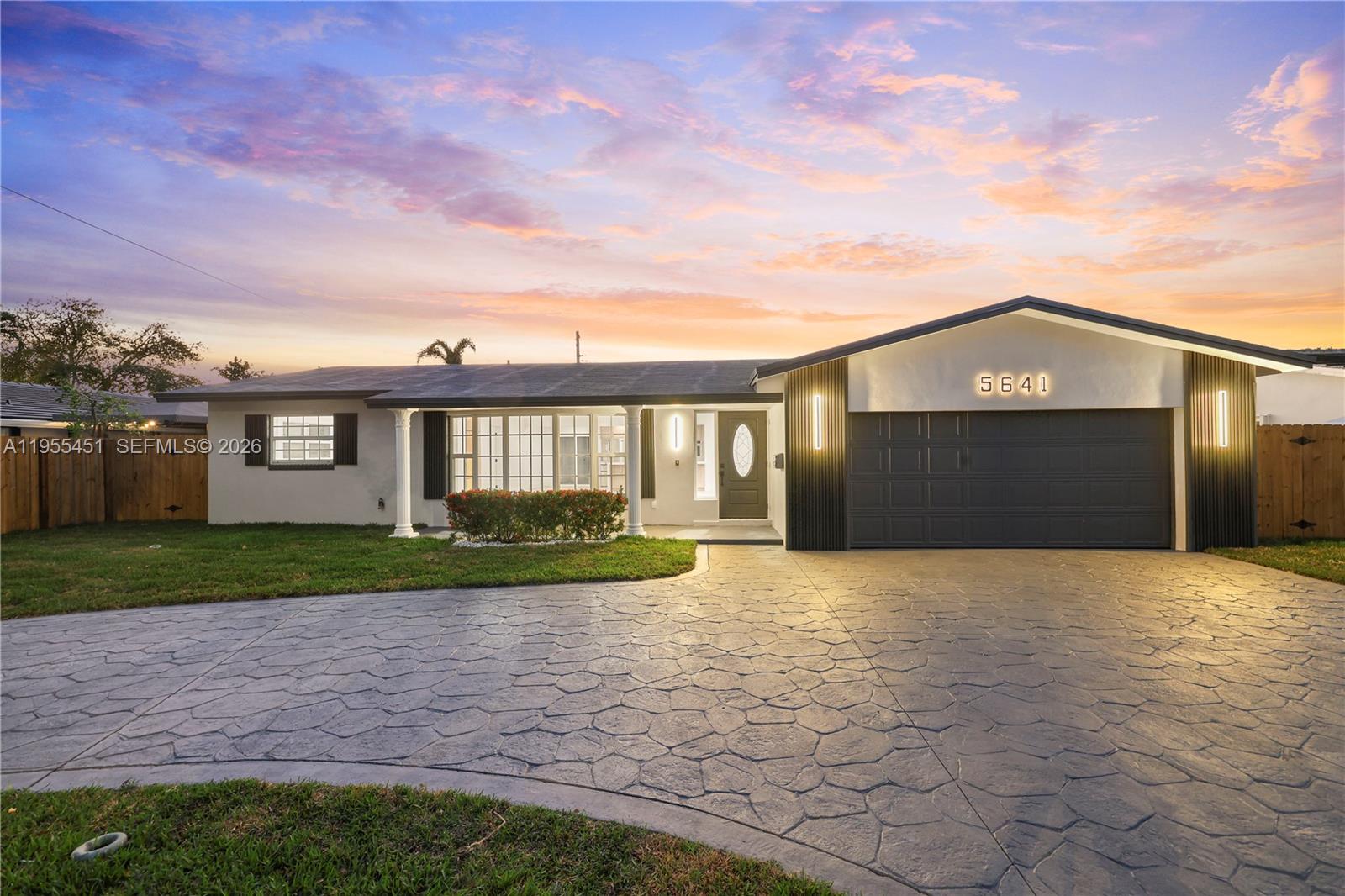 Fully renovated home with fully fenced pool in coveted Imperial Point! Features (wood-look) tile flooring throughout, impact windows and doors, tankless water heater, and electric toilets in all bathrooms with brand new doors on the entire house, yes even the closets! Open-concept living area with custom SOLID-WOOD kitchen, Calacatta Gold countertops, double wall oven, and ample cabinetry—ideal for everyday living and entertaining.

Smart light switches in all 4 bedrooms and living room. Primary suite with dual walk-in closets and bathroom with tub. Additional upgrades include recessed lighting throughout and new electrical panel. Double garage plus parking for 6+ vehicles. Conveniently located near shopping, the beach, and Las Olas Boulevard.