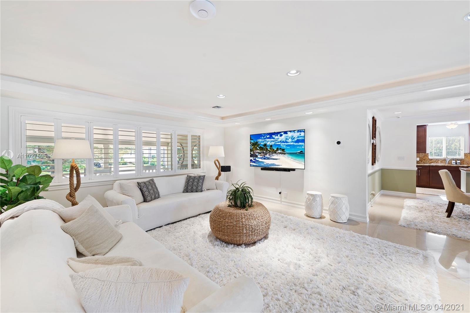 Welcome to one of East Fort Lauderdale's most prestigious neighborhoods, minutes away from the Intracoastal & Lake Sylvia.  This home enjoys priority access to the nearby Ocean Club that features a private beach, cabanas, grilles & much more.  This home’s canal view is alive with boating activity, and even a glimpse of the cruise ships at Port Everglades.  Entering this home, you are greeted by an open floor plan, perfect for indoor and outdoor entertaining.  This remodeled home features 3bed+den, or can be converted to 4 bedrooms.  Features include a large kitchen with breakfast nook, large covered patio with fireplace, pool, and impact windows & doors.  This property is on a wide canal & offers 100' of deep water dockage with a concrete dock. Near great restaurants, services and airport.