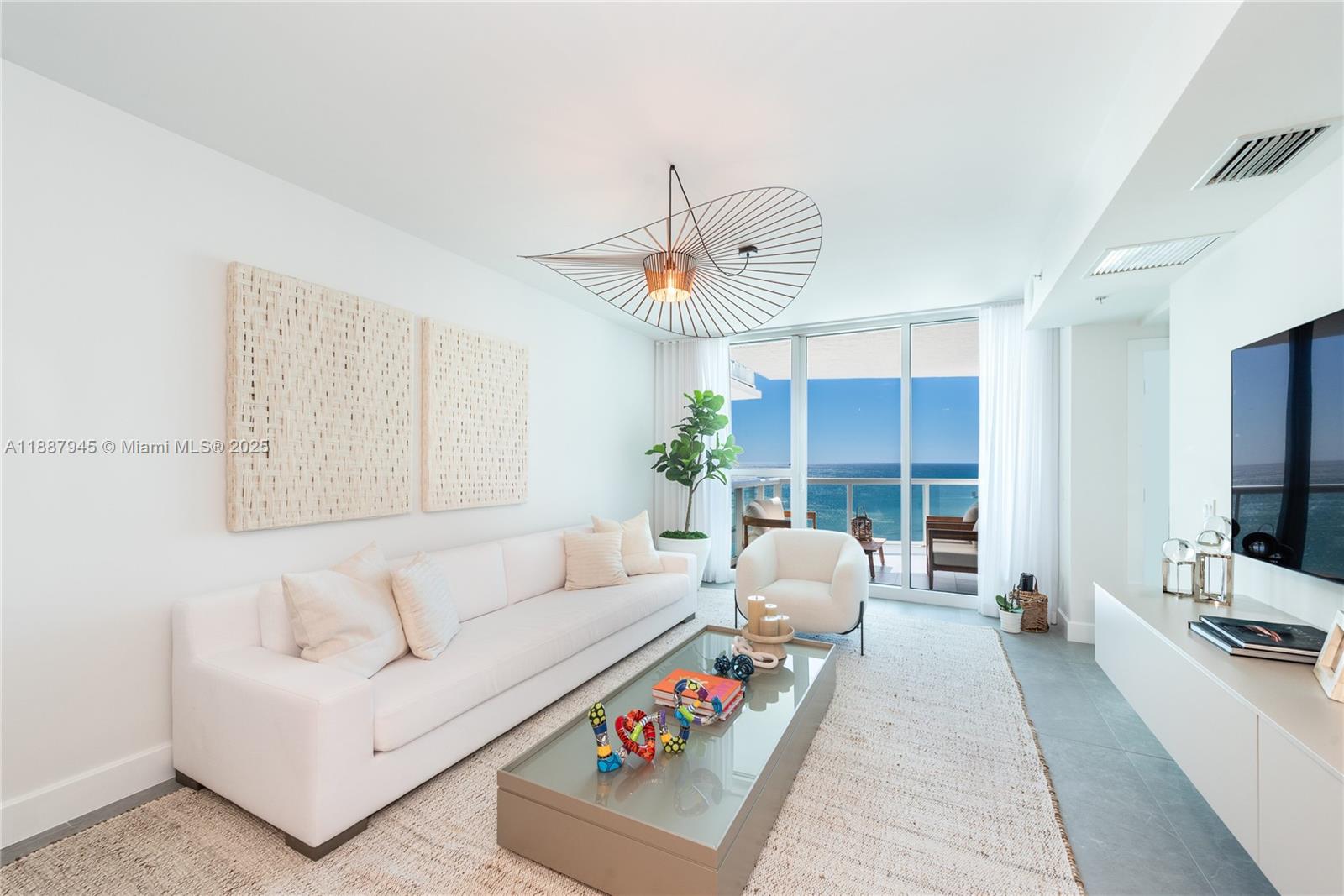 Mosaic Condo is an exclusive boutique building in Miami Beach with only 84 residences. This completely remodeled thru-unit features 3 spacious bedrooms, 3 bathrooms, and private balconies showcasing both direct ocean views and city skyline vistas. The open living area connects seamlessly with a gourmet kitchen, breakfast bar, and dining space, complemented by sleek tile floors and custom finishes throughout. The oceanfront primary suite offers balcony access and abundant natural light. Residents enjoy resort-style amenities including beach access with service, oceanfront pool, state-of-the-art gym, cinema, party room, concierge, valet, and 24-hour security—delivering the perfect mix of boutique privacy and Miami Beach luxury. Furniture can be included in the sale. SPECIAL ASSESSMENT HAS BEEN ALREADY PAID BY SELLER!!!