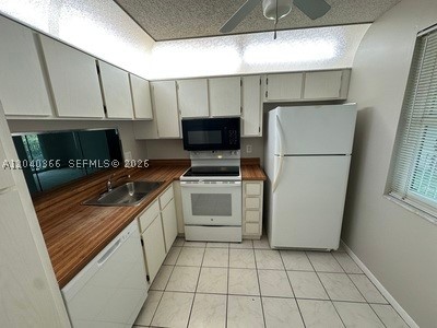 Freshly painted and move-in ready 1-bedroom, 1.5-bath condo located on the second floor in a desirable all-ages community. This well-maintained unit features impact windows throughout, a full-size washer and dryer, one assigned parking space, and plenty of guest parking. Residents can enjoy the community pool and an unbeatable location within walking distance to Downtown Coral Springs, restaurants, shopping, entertainment, and a nearby hospital. Situated in a highly sought-after school district, this property is ideal for first-time homebuyers, seasonal residents, or investors. Association requires a minimum credit score of 675 for all applicants 18 years of age and older.