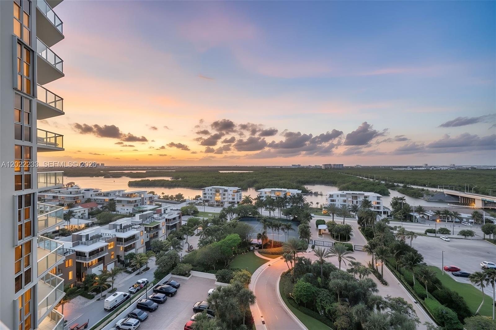 Welcome to waterfront living at its finest! This beautifully maintained residence offers an artistic touch throughout, featuring ceramic tile flooring, wood finishes in the kitchen and bathrooms, and a chef’s kitchen designed for both functionality and style. The spacious primary bathroom includes convenient pull-out storage features for added organization. This unit combines comfort, lifestyle, and unbeatable views, including stunning sights of the iconic Guitar Hotel and passing yachts along the waterway. Residents enjoy resort-style amenities including 2 pools, sauna, fitness center, tennis courts, pickleball courts, charging stations, and an on-site café. The beach is steps away from your new home.