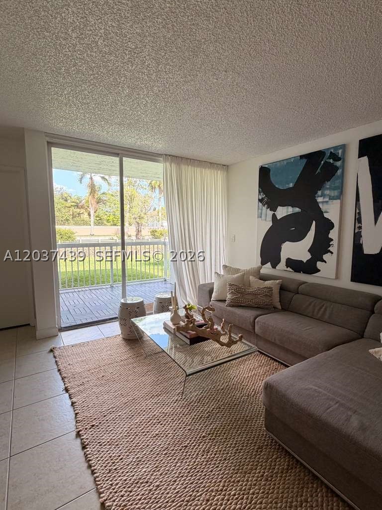 Welcome to this stunning ground-floor apartment located in the heart of Doral! Situated in a secure, private, gated community with 24/7 security. The unit features a brand-new shower and flooring in the bedroom, adding a fresh and modern touch. Enjoy the convenience of a central location close to shops, restaurants, and everything Doral has to offer.