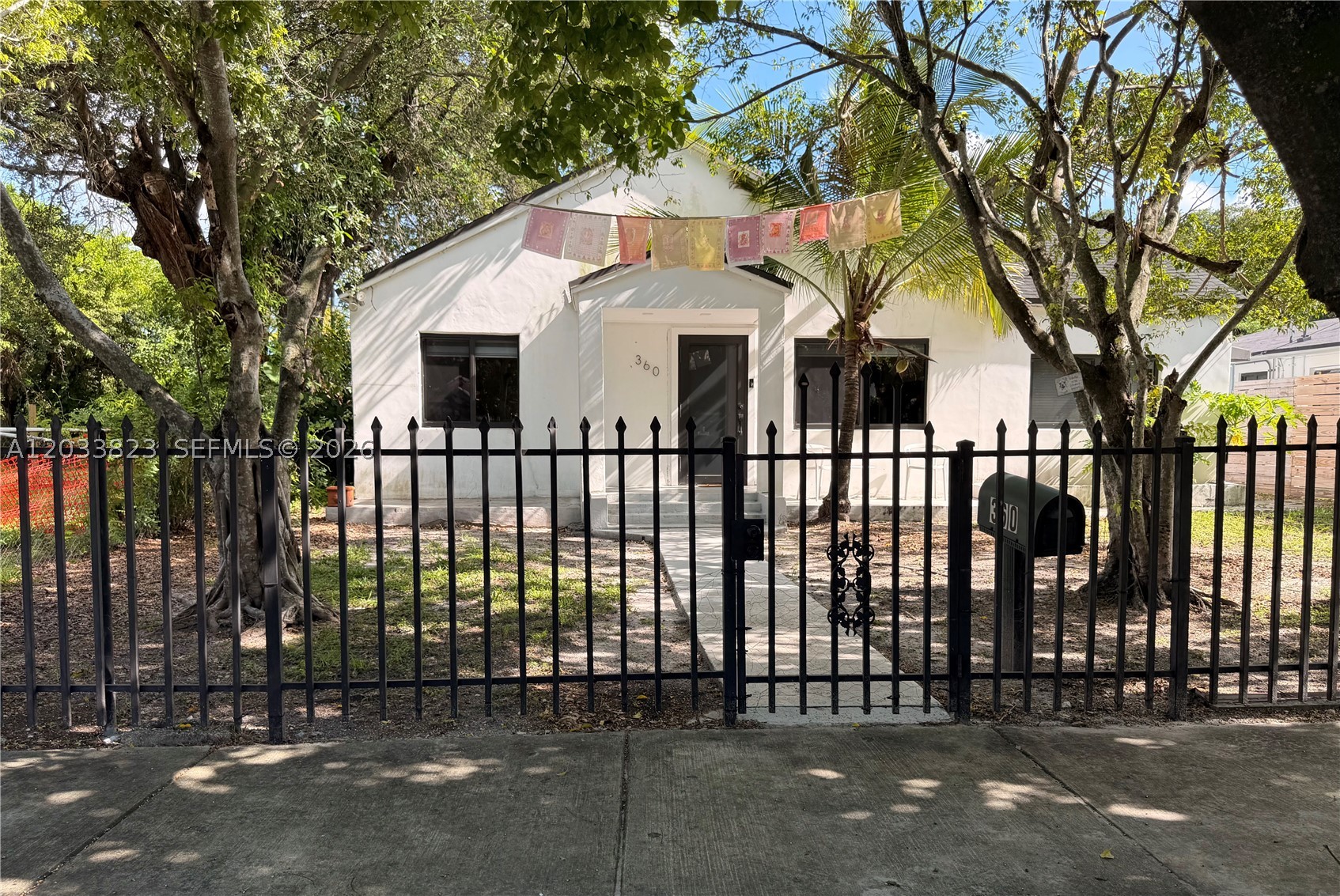 Beautiful remodeled home with exceptional taste and attention to detail. This warm property offers a cozy atmosphere with plenty of natural light and green views from every window...The kitchen features top of the line appliances, a wine cooler and an oversized window overlooking the backyard. Located just 5 minutes from Wynwood and 3 blocks from the Design District and Midtown. Appointment only. Call listing agent.