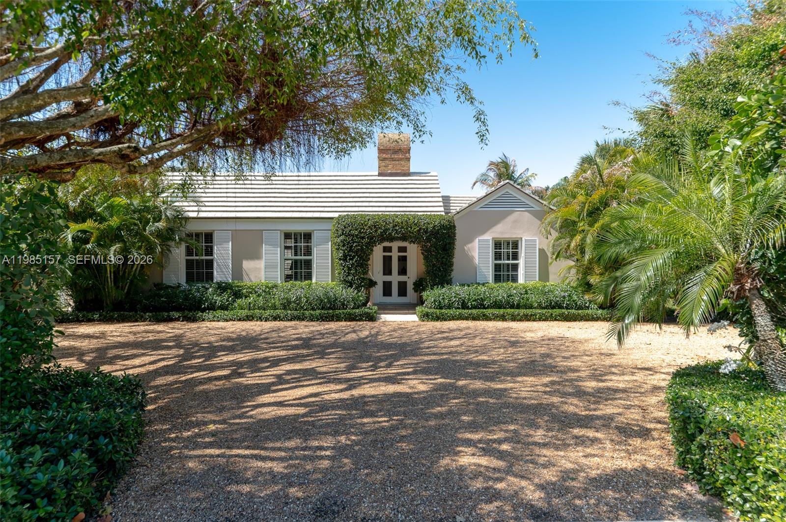 This charming Jupiter Island cottage perfectly blends timeless design with relaxed coastal living. The well-appointed residence offers 4 bedrooms and 4 bathrooms, providing comfort and privacy for both family and guests.
Light-filled interiors transition seamlessly to inviting outdoor living spaces, ideal for everyday enjoyment and effortless entertaining. A dramatic 60-foot lap pool is beautifully framed by lush, mature landscaping, creating a private garden sanctuary with thoughtfully designed pathways and tranquil sitting areas—an exceptional opportunity to experience Jupiter Island’s understated elegance and serene lifestyle.