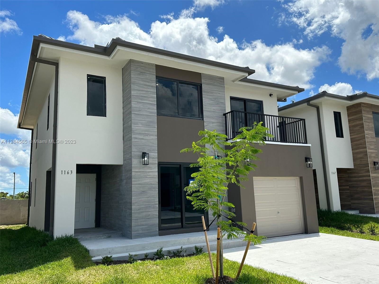 BEAUTIFUL NEW CONSTRUCTION, 2 story home, 5 beds 4.5 baths, garage & fenced backyard. Located in a great residential community in Florida City. Beautiful open kitchen with s/s appliance, stone counter top, double sink. Front load full side washer & dryer. Title flooring throughout the house, impact windows. This house offers a full bedroom with closet & bathroom downstairs . Master room with walking closet and double sink in bathroom. Excellent finishes throughout the house. YOU HAVE TO SEE IT!!!!! ONLY 1st MONTH RENTAL AND 1 MONTH SECURITY DEPOSIT!!