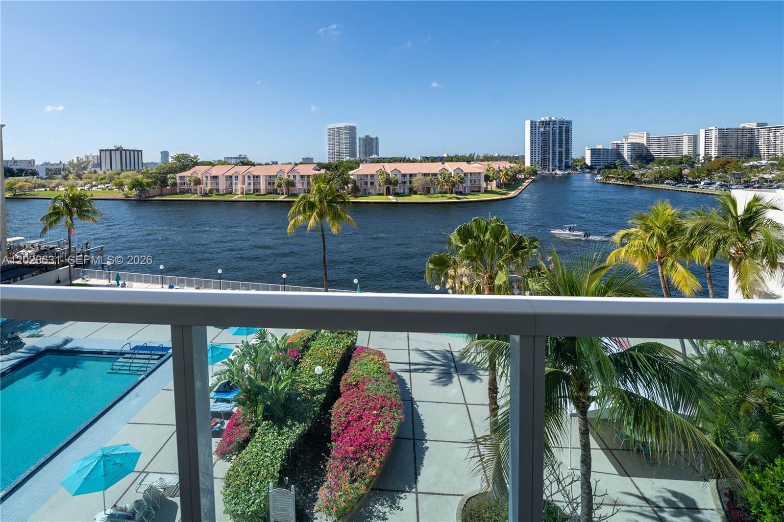 1,553 sq ft wraparound corner unit, the largest line in the Hallmark building. Enjoy stunning views of the Intracoastal, pool area, and bay with boat docks. This is one of the most sought-after lines in the building thanks to its prime location, generous layout, and impressive size. Residents enjoy resort-style amenities including a heated pool overlooking the Intracoastal, fully equipped gym, two saunas, billiards room, grill and picnic area, courtesy bus, 24-hour security, valet, and assigned covered parking. Close to the Hollywood Broadwalk and just steps from the Diplomat and Hyde Hotels for the best of coastal living.