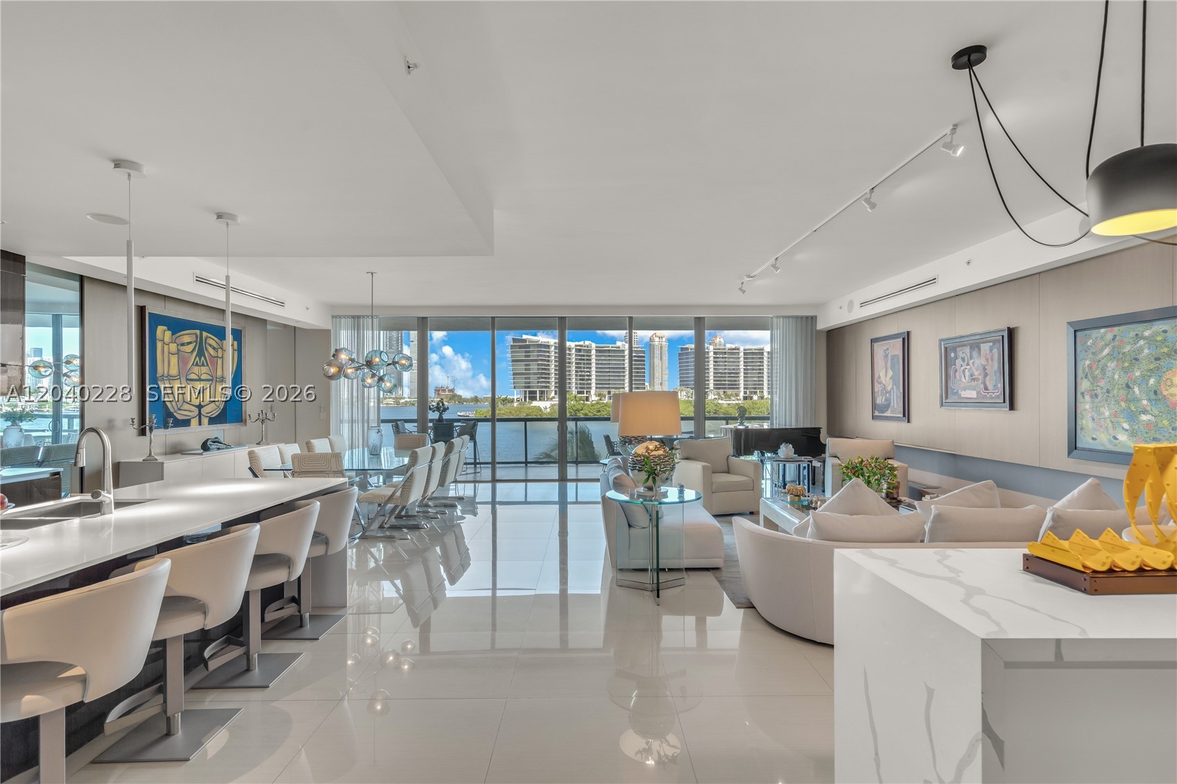 Experience luxury living in this spectacular Cul-de-sac corner residence at Echo Aventura, one of the most desirable waterfront buildings in Aventura. Enjoy breathtaking Intracoastal water views with unforgettable sunrises and sunsets from every angle.  This exceptional home features natural gas, two gourmet kitchens, an outdoor kitchen with a built-in barbecue, top-of-the-line appliances, four luxurious bedroom suites with walk-in closets, soaking tubs and separate showers, a spacious den that can serve as a fifth bedroom, and a private staff suite with its own bathroom and kitchen.  A rare opportunity to own one of Aventura's finest waterfront residences.
