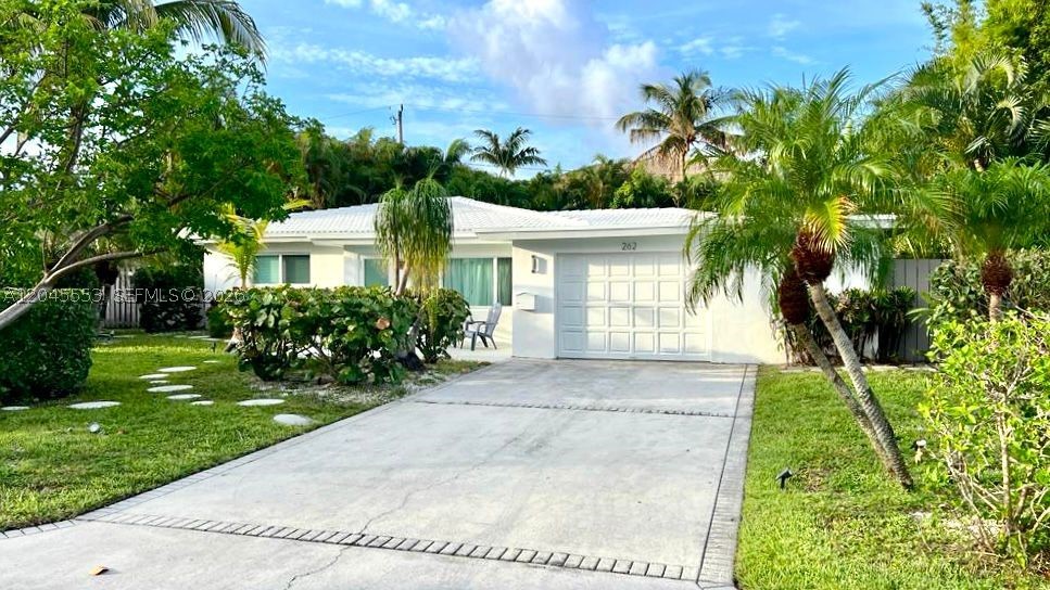 Experience the quintessential Florida lifestyle in this stunning Mid-Century Modern beach retreat. Beautifully updated while preserving its timeless architectural charm, this exceptional home blends classic design with today's modern comforts. The designer kitchen features Carrara marble countertops, a large island, Sub-Zero refrigerator with wine cooler, Viking Designer wall oven, and Thermador dishwasher. Gleaming terrazzo floors, impact windows and doors, and a garage with workshop space add style and functionality. Walls of sliding glass doors in the Florida room create seamless indoor-outdoor living, overlooking the beautifully landscaped patio and pool. Enjoy year-round outdoor entertaining on the screened patio, perfect for al fresco dining. Ideally located just blocks from the beach, fishing pier, restaurants, shopping, grocery stores, nightlife, and entertainment. Pet-friendly and offered beautifully furnished, this is the perfect full-time residence, vacation home, or investment opportunity. *Furniture included *Available for short- or long-term rent as well. Call listing agent for more info