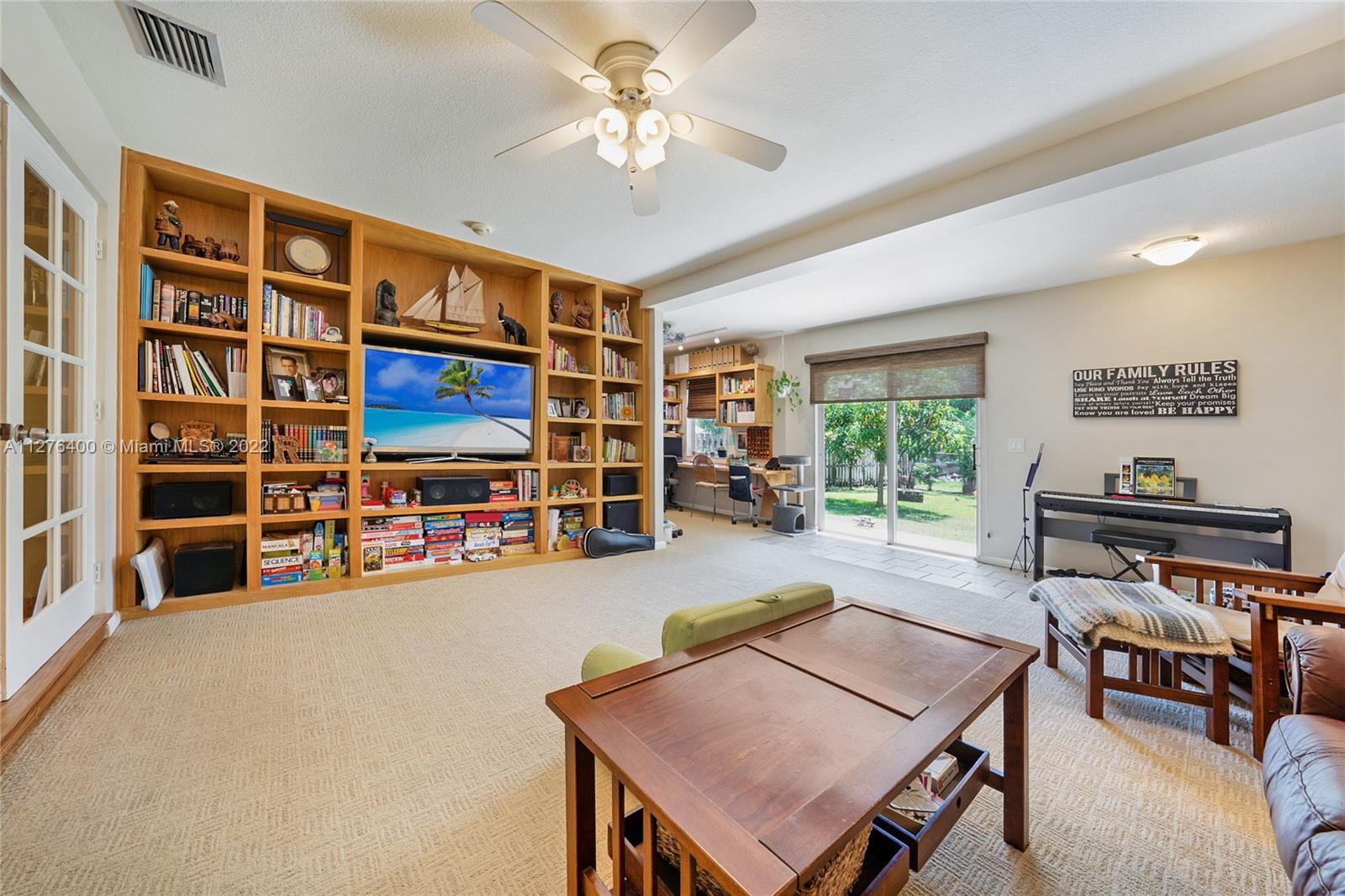 Stunning 4/2 home is centrally located half a mile from I-95 and Tri rail, 2 miles from Beach, great shopping within 2 miles, neighborhood boat ramp access to Lake Ida, Lake Osborne, Tennis, Basketball courts, & playground. Huge back yard is a lovely oasis with fire pit, large shed/workshop & room for a pool. Extra large family room perfect for family gatherings and entertaining with a custom made wall unit & custom office area. Enjoy the custom built extra large Master bedroom suite and walk- in closet. Oversized room which can be made into a playroom/media or office space. Home is equipped with wiring for audio throughout ceiling speakers included. Brand new roof with permits and high impact windows ( except for 3 and 1 back sliding) throughout. Do not miss this rare opportunity.