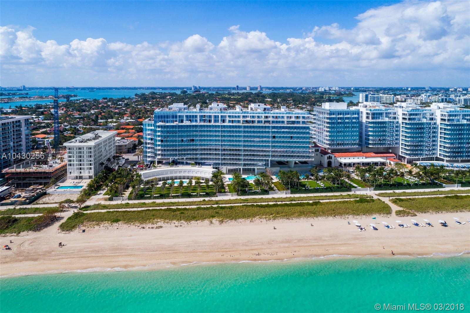 Inspired by its beautiful location, situated on nine acres of oceanfront gardens & intimately scaled at just 12-stories, Four Seasons Residences at The Surf Club is the glamour of Miami distilled into a serene and sophisticated setting. Designed by Pritzker Prize-winning architect Richard Meier, his design seamlessly integrates indoor & outdoor living with custom glass floor-to-ceiling windows. The unit itself boasts marble floors, Subzero & Miele kitchen appliances and direct ocean views encompassing 2 beds + den, 3.5 bathrooms and 2,404 SF of interior space. Four Seasons Residences at The Surf Club has the prestigious residential address with all the advantages and amenities of living in a grand hotel.