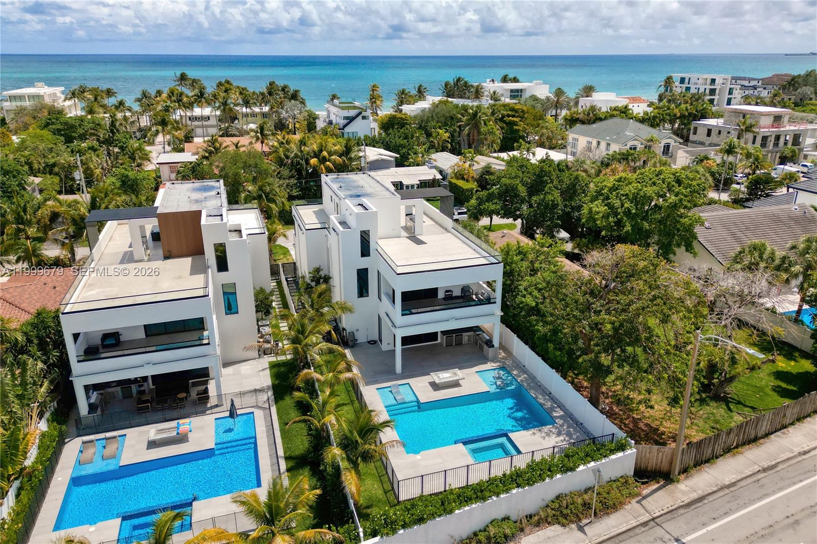 Welcome to your dream home, steps away from the shores of Fort Lauderdale Beach. Located in a private community with 24/7 police monitoring, this home offers a prime South Florida lifestyle, including beach access, all in a walkable neighborhood. This modern three-story home boasts an open concept layout. It features 5 spacious bedrooms with the potential for a 6th and 6 elegant bathrooms. The expansive living and dining areas flow seamlessly to outdoor spaces. Step outside to discover a private backyard, complete with a sparkling pool and tons of space for gatherings. The massive rooftop terraces offer ocean and downtown skyline views, creating a dreamy backdrop setting for sunsets or morning yoga. Don’t miss the opportunity to own this exquisite property that truly redefines coastal living! Lauderdale Beach is one of Fort Lauderdale’s most exclusive and intimate beachfront residential neighborhoods, known for its peaceful, coastal character and close-knit community of only roughly 200 homes nestled along the Atlantic shoreline. With its limited inventory and unbeatable location, Lauderdale Beach remains one of the most coveted residential pockets in Fort Lauderdale. One of the only communities EAST of the A1A.