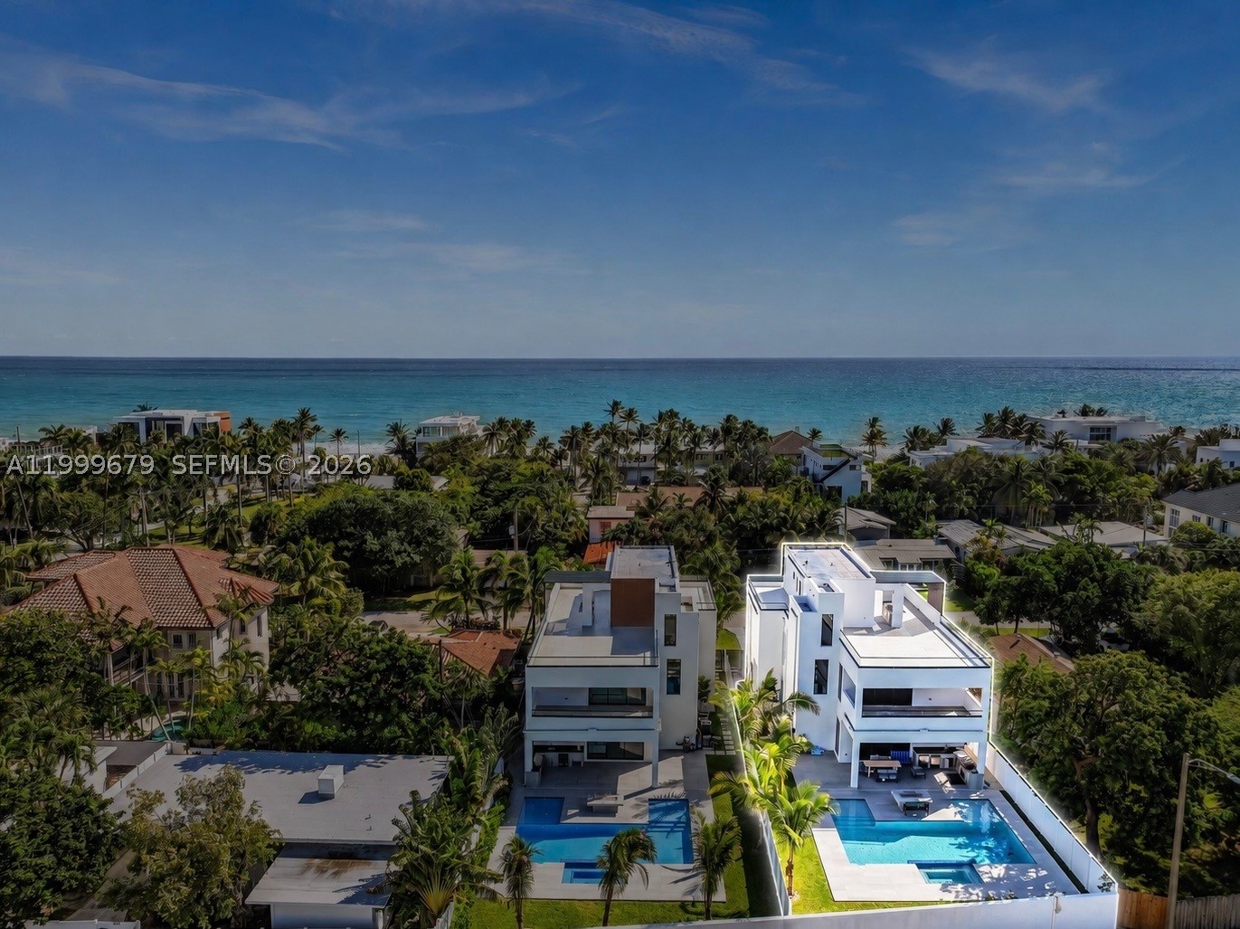 Welcome to your dream home, steps away from the shores of Fort Lauderdale Beach. Located in a private community with 24/7 police monitoring, this home offers a prime South Florida lifestyle, including beach access, all in a walkable neighborhood. This modern three-story home boasts an open concept layout. It features 5 spacious bedrooms with the potential for a 6th and 6 elegant bathrooms. The expansive living and dining areas flow seamlessly to outdoor spaces. Step outside to discover a private backyard, complete with a sparkling pool and tons of space for gatherings. The massive rooftop terraces offer ocean and downtown skyline views, creating a dreamy backdrop setting for sunsets or morning yoga. Don’t miss the opportunity to own this exquisite property that truly redefines coastal living! Lauderdale Beach is one of Fort Lauderdale’s most exclusive and intimate beachfront residential neighborhoods, known for its peaceful, coastal character and close-knit community of only roughly 200 homes nestled along the Atlantic shoreline. With its limited inventory and unbeatable location, Lauderdale Beach remains one of the most coveted residential pockets in Fort Lauderdale. One of the only communities EAST of the A1A.
