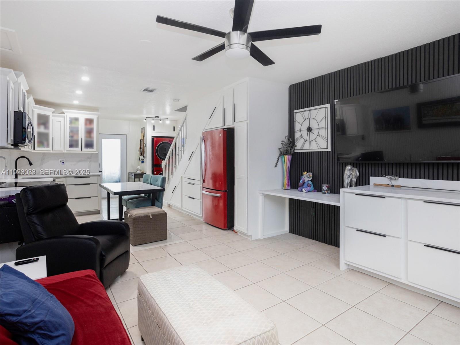 Delightfully & completely updated 2-BD/1.5-BA townhome in the heart of Miami. First floor greets you w/ an updated open kitchen followed by open living area w/ custom built-ins plus covered private patio & guest bath. Upstairs are two sizable bedrooms (each w/ its own balcony) + full bath w/ tub & new flooring. Other highlights include hurricane impact glass throughout, new appliances (including in-unit washer/dryer), new electric panel, custom cabinets throughout. This community has only 5 units, low HOA fee, gated parking & recently completed 40yr recert. Location is ideal, next to Miami River & Jose Marti Park, w/ easy access to major highways, Downtown Miami, Brickell, & Calle Ocho. This property feels like a true home, complete with customized touches that make sense and look great!