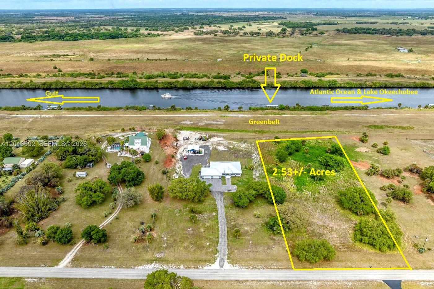 Rare Riverfront Acreage with Dock & Deeded Access — Build-Ready and Resilient An exceptional opportunity in Port LaBelle Ranchettes, this unique offering features a 2.53-acre buildable homesite paired with a separate 1.5-acre deeded easement providing permanent, private access to the Caloosahatchee River—complete with an existing dock. Thoughtfully positioned inland while still offering deep-water access to Lake Okeechobee, the Gulf, and the Atlantic Ocean, this property combines privacy, flexibility, and long-term value rarely found in riverfront ownership. Property Highlights: 2.53-acre buildable lot (easement not included in acreage) 1.5-acre deeded river easement with private dock Land cleared and prepared; cabbage palms and dead trees removed, mature oaks trimmed Electric service available; well and septic required Survey available Horses permitted with special exception Resilience Advantage: Unlike traditional coastal waterfront properties, this homesite is safely inland, offering: Reduced storm surge risk Lower hurricane exposure Potentially more favorable insurance costs Build your dream home where peaceful country living meets private riverfront access—offering space, privacy, and added security for generations to come.