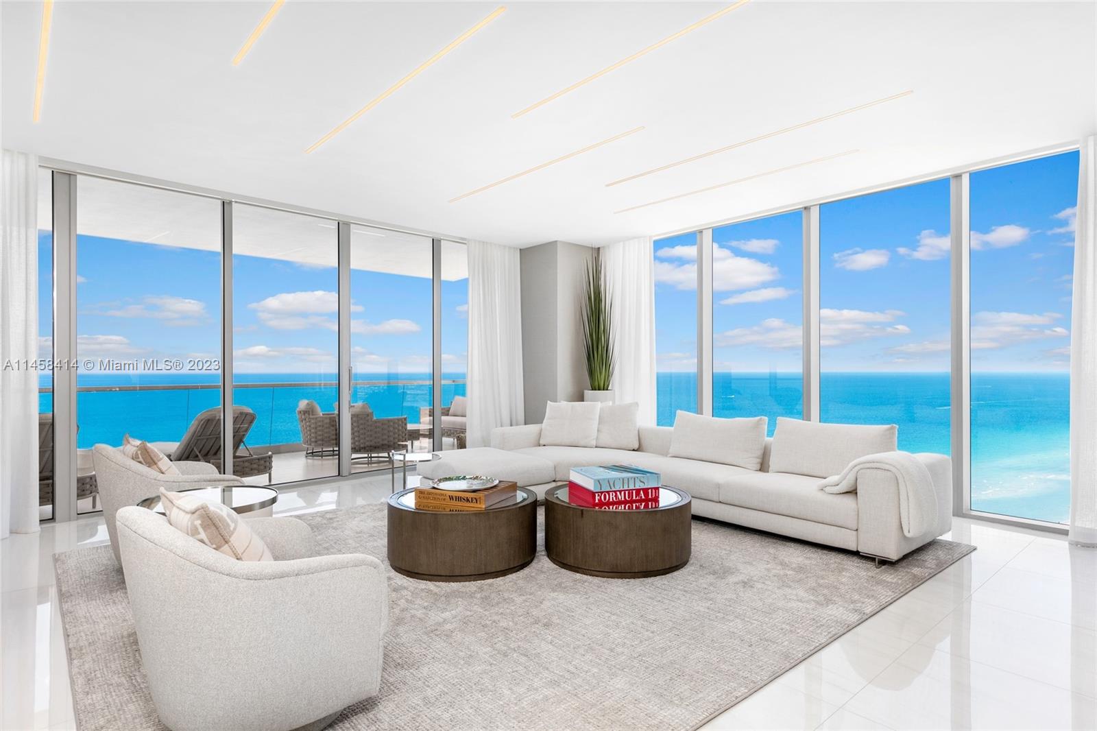 When only the best will do! Breathtaking Residence that was finished & furnished by a renowned design firm w/ no expense spared while creating this masterpiece which offers Ocean, Downtown skyline sunsets & bay views. A flow through layout w/ 10'+ ceilings & walls of glass which flood the home with natural light. 4 oversized en-suite bedrooms + a playroom which can also be an office or staff room. Features include custom millwork, custom closets, upgraded lighting & AV, private elevator, 860 SF of terraces, Snaidero kitchen w/ gaggenau appliances, summer kitchen & more. Included is a rare cabana w/ AC, kitchenette, full bath & private jacuzzi. Turnberry Ocean Club has 5 Star services w/ over 70,000 SF of amenities including a private restaurant & cafe.