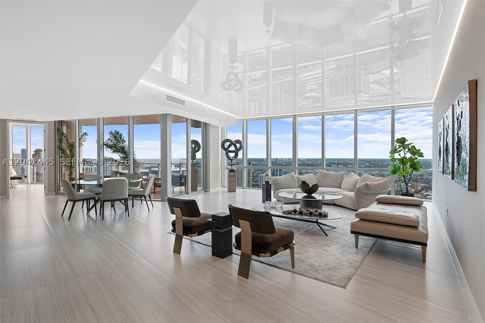Best priced Penthouse in all of Downtown! Immerse yourself in breathtaking 180-degree views from this sleek 3,300 square foot TROPHY Penthouse. Elevate your lifestyle by living in the heart of the new MIAMI WORLD CENTER. Over 250k in furnishings, 4 Bedrooms plus a large den, and 5 full bathrooms. The building you never have to leave includes every amenity. 5 pools, private jacuzzi’s, a FULL Spa, state of the art fitness center, boxing ring, basketball court, racquetball, yoga, recording studio, and so much more. Walk downstairs and you are steps from Kaseya Center, Port of MIA, Club Studio, Lululemon, and the best restaurants Miami has to offer.