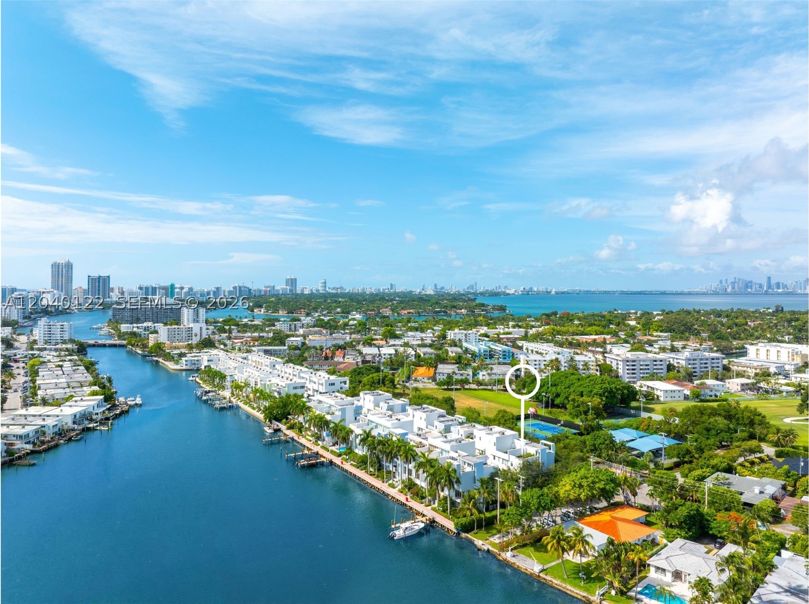 Fully renovated, contemporary townhouse in Avanti, a desirable waterfront community built in 2006 in the heart of Normandy Isle, Miami Beach. This exceptional 4-story corner residence offers abundant natural light, beautiful park and water views, and an ideal blend of style, comfort, and functionality. Featuring 3 bedrooms, each with an en-suite bathroom, a guest powder room, two private terraces, and a spacious 2-car garage equipped with an electric vehicle charger, this move-in-ready home has been thoughtfully upgraded throughout. The beautifully redesigned interior showcases porcelain flooring, fully renovated bathrooms with modern finishes, upgraded interior doors, smart light switches and outlets, two new A/C systems, and a new washer and dryer. The open-concept kitchen is equipped with stainless steel appliances, a center island, and direct access to a private balcony overlooking the water.
The spacious primary suite provides a peaceful retreat, while the first-floor third bedroom offers flexibility as a guest suite, home office, or gym. Enjoy two private terraces with different exposures—one featuring serene water views and the other overlooking the park and golf course. Residents enjoy Avanti's waterfront pool and community boat slip, all while benefiting from incredibly low HOA fees.
Located just steps from Fairway Park, Golf, tennis, beach, restaurants, and local shops, this residence offers the very best of Miami Beach living. A rare opportunity and a must-see.