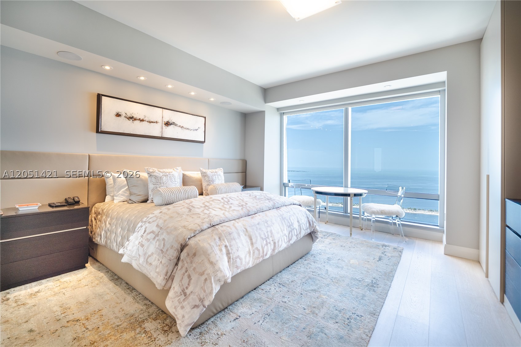 EXTRAORDINARY PRIVATE PENTHOUSE RESIDENCE | FOUR SEASONS RESIDENCES MIAMI – BRICKELL. This extraordinary combined penthouse residence offers the rare opportunity to experience the privacy and elegance with the legendary service and hospitality of one of the world’s most recognized luxury brands. showcases timeless European craftsmanship, finishes, and breathtaking panoramic views of the Atlantic Ocean, Biscayne Bay, and Miami’s iconic skyline. The Condo features two expansive primary suites and an elegantly appointed guest bedroom, Every detail reflects sophistication and quality, including large-format Italian marble flooring throughout the residence and exquisite Spanish marble detailing at the entrance areas, creating an impressive and unforgettable arrival experience.

The gourmet kitchen features premium Italian cabinetry by Miaccuna, combining refined design with functionality. A private entertainment bar offers the perfect setting for intimate gatherings, while the professionally conditioned wine cellar provides the rare ability to store and preserve a collection of up to approximately 1,500 bottles — an extraordinary amenity for the most passionate wine collectors.

The residence is fully equipped with integrated technology, including whole-home audio, advanced lighting automation, and televisions throughout the bedrooms, creating a seamless environment of comfort and convenience.

Floor-to-ceiling windows showcase spectacular views of the ocean and Miami skyline, offering an ever-changing backdrop from sunrise to sunset.

Beyond the residence itself, owners enjoy the unparalleled lifestyle and services of Four Seasons Residences Miami, including:

• 24/7 dedicated concierge services, providing personalized assistance and attention to every resident’s needs.
• Exclusive access to the renowned Equinox fitness club, offering world-class wellness and training facilities.
• Two dedicated parking spaces with 24/7 valet service.
• Full access to the exceptional amenities and services of the Four Seasons Hotel, allowing residents to enjoy a true five-star hospitality experience within their own home. This rare penthouse opportunity combines the privacy of a luxury private residence with the convenience, security, and personalized service of a world-class hotel.

A true collector’s residence — where elegance, sophisticated technology, exceptional entertaining spaces, and unparalleled Miami living come together in one extraordinary home.