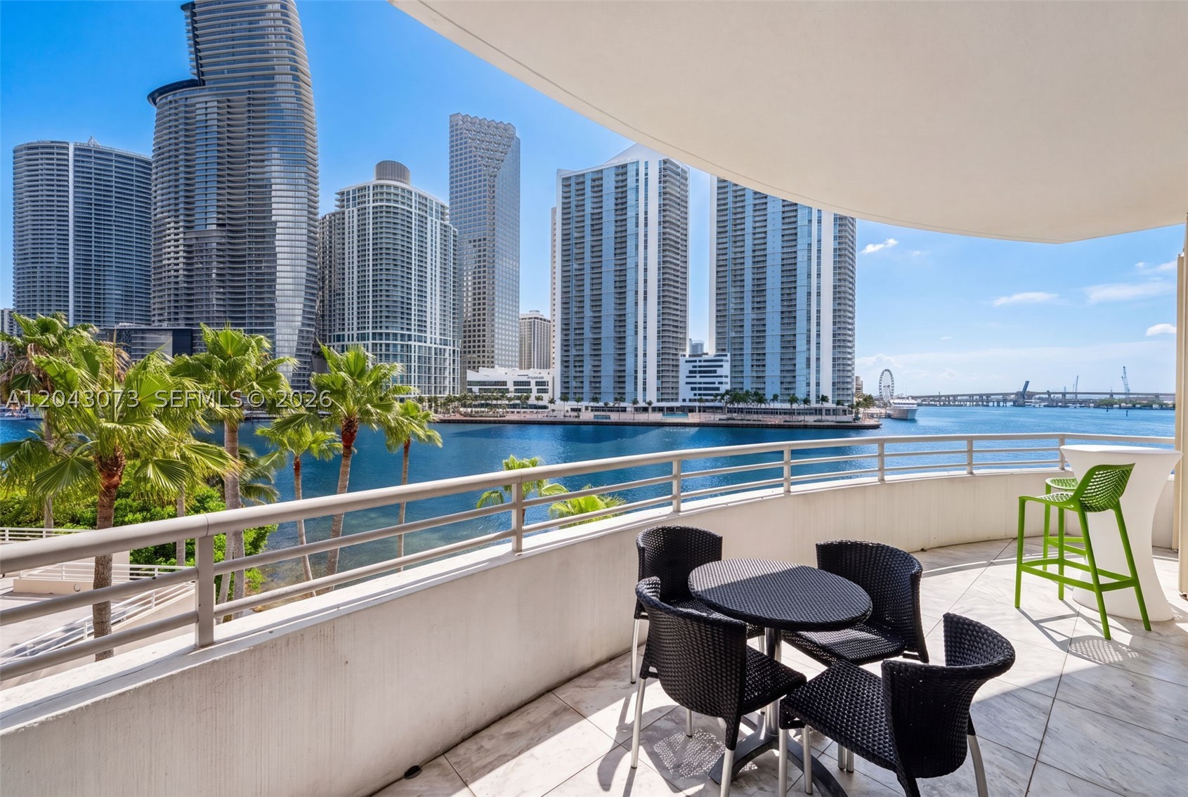 Welcome to Residence 404 at One Tequesta Point, a beautifully renovated northeast corner residence in the exclusive island community of Brickell Key. This exceptional 2-bedroom, 2-bathroom plus den home offers approximately 1,280 square feet of thoughtfully designed living space with soaring ceilings, abundant natural light, and tranquil bay and skyline views. Located on the highly desirable fourth floor, the residence enjoys the convenience of direct access without reliance on elevators, creating a unique, house-like living experience.
