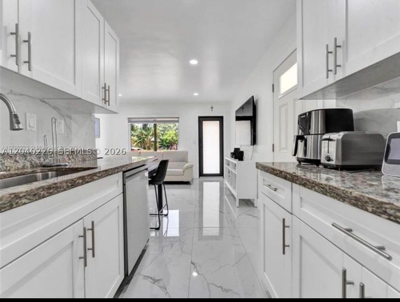 Rare opportunity in the heart of Pompano Beach! This 3-bedroom, 2-bath home features a 2022 shingle roof, a fully fenced oversized lot with ample space for boats, trailers, RVs, work trucks, and multiple vehicles. Ideally located just minutes from the beach, shopping, dining, parks, and major highways. Offering outstanding potential as a primary residence, vacation home, or investment property. Perfect for families, professionals, or anyone seeking privacy, flexibility, and the freedom to enjoy South Florida living. Don’t miss this unique opportunity!
