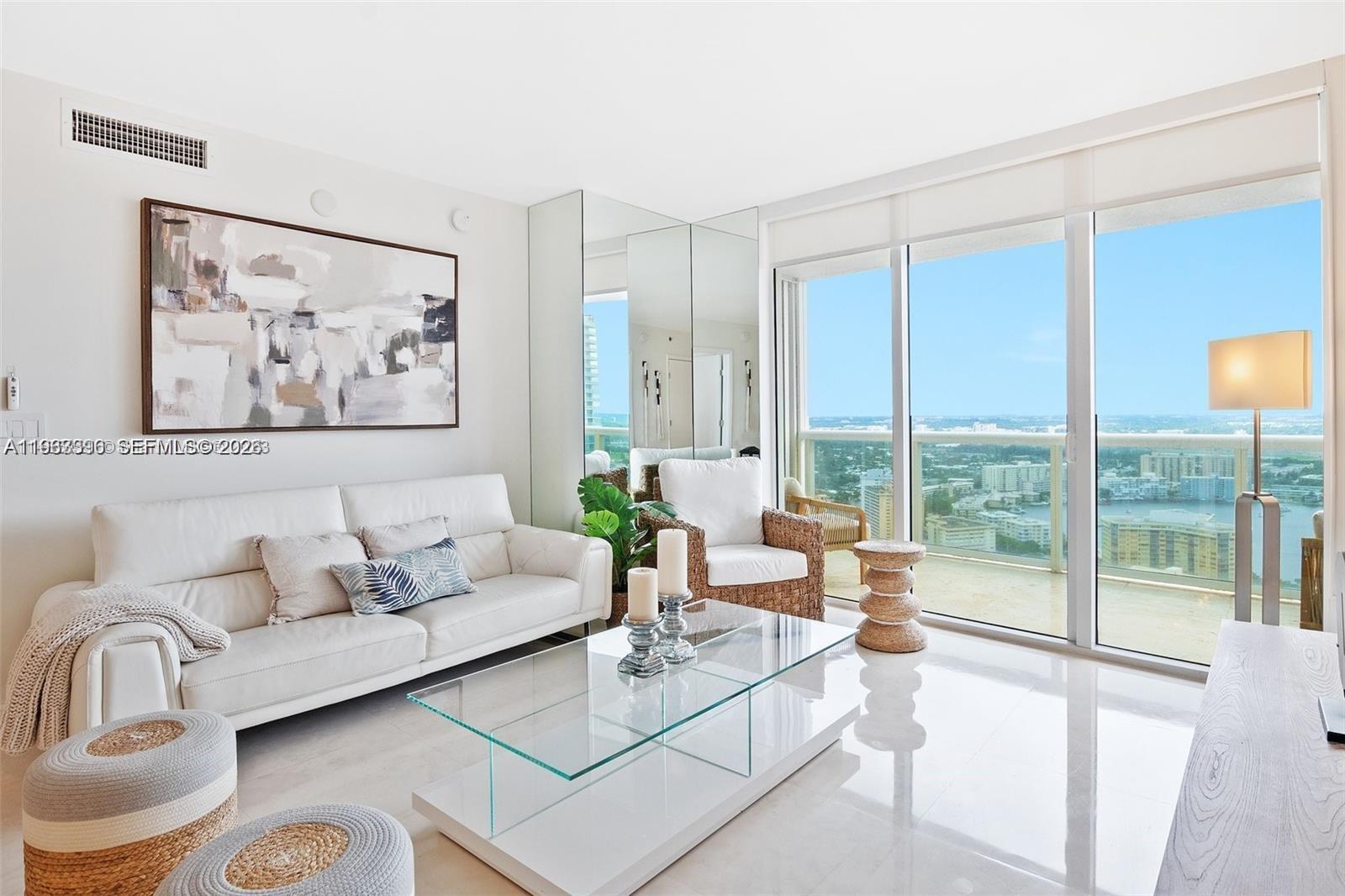 Experience luxury oceanfront living in this beautifully renovated residence located in  Beach Club building. The unit  located on 36th floor with stunning intercoastal and city views. 3 Bedroom 3 Bath, contemporary design and high-end finishes , the property features direct private beach access with exclusive beach service, allowing you to enjoy the best of South Florida’s oceanfront lifestyle. including a state-of-the-art oceanfront fitness center. Ideally located within walking distance to premier shopping, fine dining, and entertainment.
