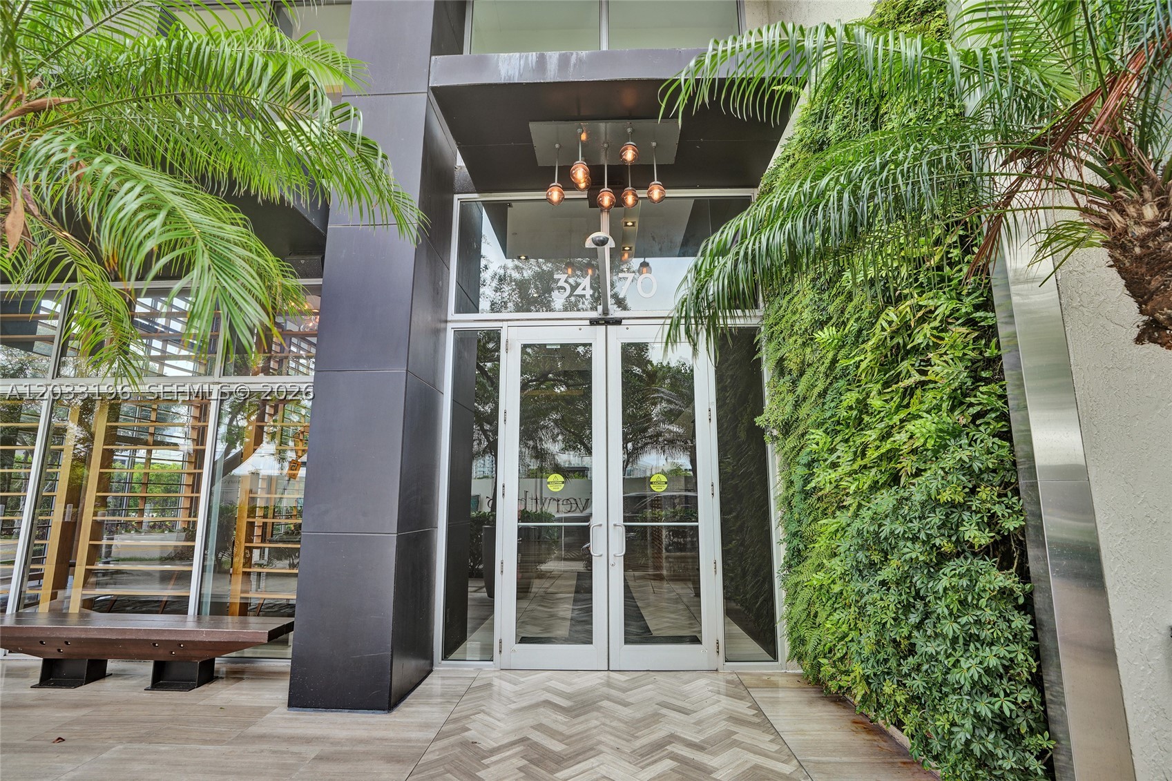 Amazing and spacious 2-bedroom, 2-bath corner residence in the heart of Midtown Miami offering breathtaking sunrise and sunset views through floor-to-ceiling windows. Filled with natural light, this beautifully appointed unit features 10-foot ceilings, quartz countertops, custom-built cabinetry, and an open-concept layout designed for comfortable living and entertaining. Enjoy seamless indoor-outdoor living with an oversized wraparound terrace featuring sleek glass railings and access from multiple rooms, creating the perfect space to relax or take in the city skyline. Located in a luxury building with exceptional amenities including a state-of-the-art fitness center, sauna, steam room, jacuzzi, outdoor lounge, and children's playground. Just steps from premier shopping, dining, Midtown, the Design District, and Wynwood. A rare opportunity to enjoy style, space, and convenience in one of Miami's most desirable neighborhoods. Must see!