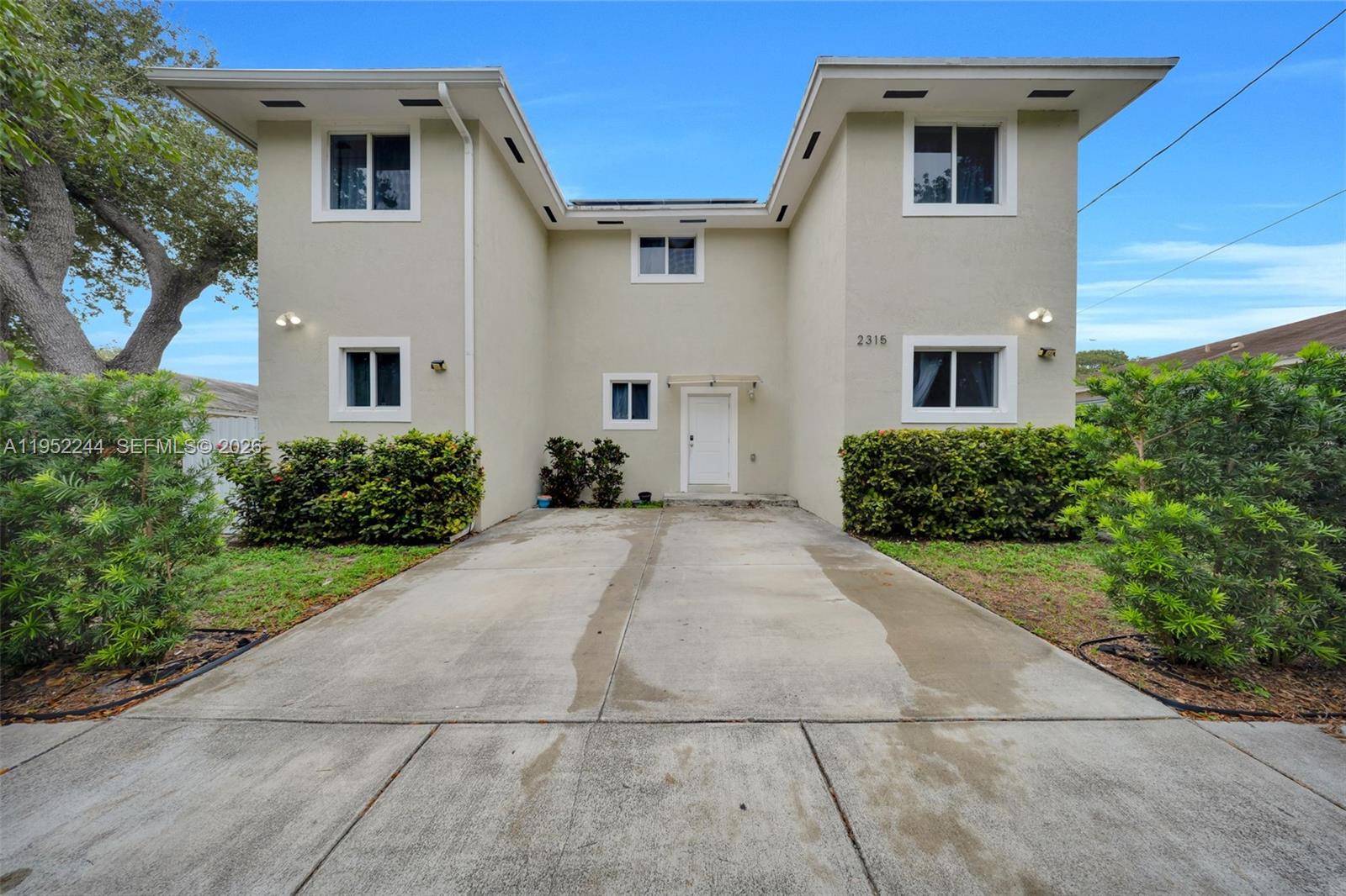 Built in 2021, this sleek 3-bedroom, 2.5-bathroom home offers the perfect blend of comfort and high-efficiency living. The property is fully protected with impact windows and equipped with solar panels (assumable solar panel loan) to keep monthly costs incredibly low. The interior features a clean look with marble stairs, stainless steel appliances, and a functional layout where both upstairs bedrooms serve as private suites with their own en-suite bathrooms. A convenient guest half-bath, in-home laundry, and a cozy back patio complete the space. Perfectly positioned for commuters and travelers, you are just minutes from major highways and the airport. This is a solid, move-in-ready home designed for effortless South Florida living.