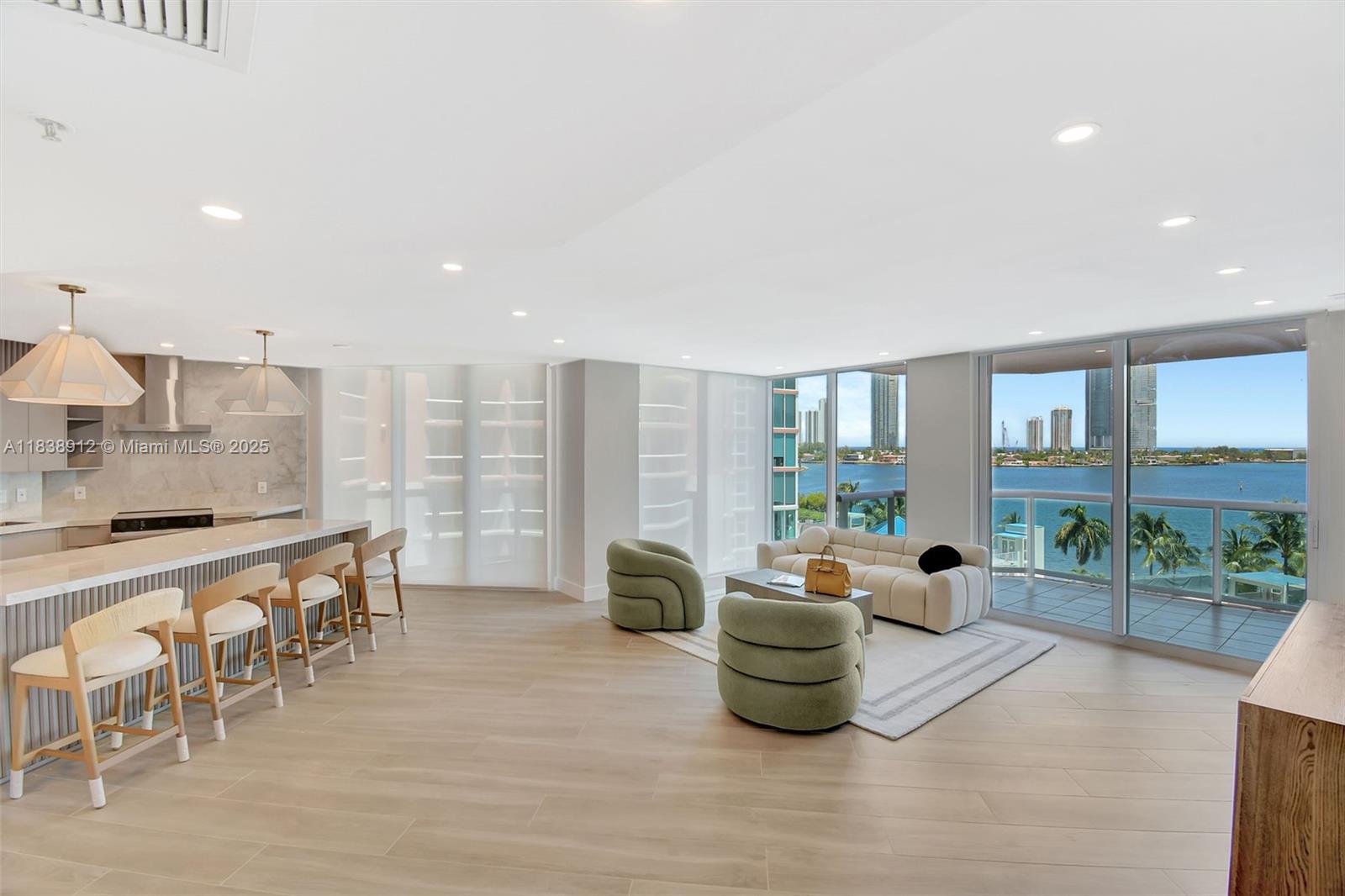 WOW! INVESTOR DREAM, JUST LEASED.  NEW NEW NEW! THIS 100% RENOVATED SPECTACULAR MODERN GEM WAS JUST COMPLETED W/NO EXPENSE SPARED AND THE ONE YOU'VE BEEN WAITING FOR! ENTER FROM SEMI-PRIVATE ELEVATOR FOYER & IMMEDIATELY & THROUGHOUT SEE THE BEST OCEAN, INTRACOASTAL, & CITY VIEWS FROM FLOOR TO CEILING GLASS WINDOWS & 3 TERRACES. OPEN STATE OF THE ART BRAND NEW CONTEMPORARY CHEF'S KITCHEN, TOP OF THE LINE APPLIANCES. ALL NEW STUNNING BATHROOMS. THE FINEST FINISHES. 2 BEDROOM ENSUITES + HALF BATH. SEPARATE LARGE UTILITY ROOM + MORE! A PERFECT 10!
5 Star amenities include: 2 story spa, pools, tennis courts, gym, private 65' marina, private park, valet, security, covered parking space, & much more.
