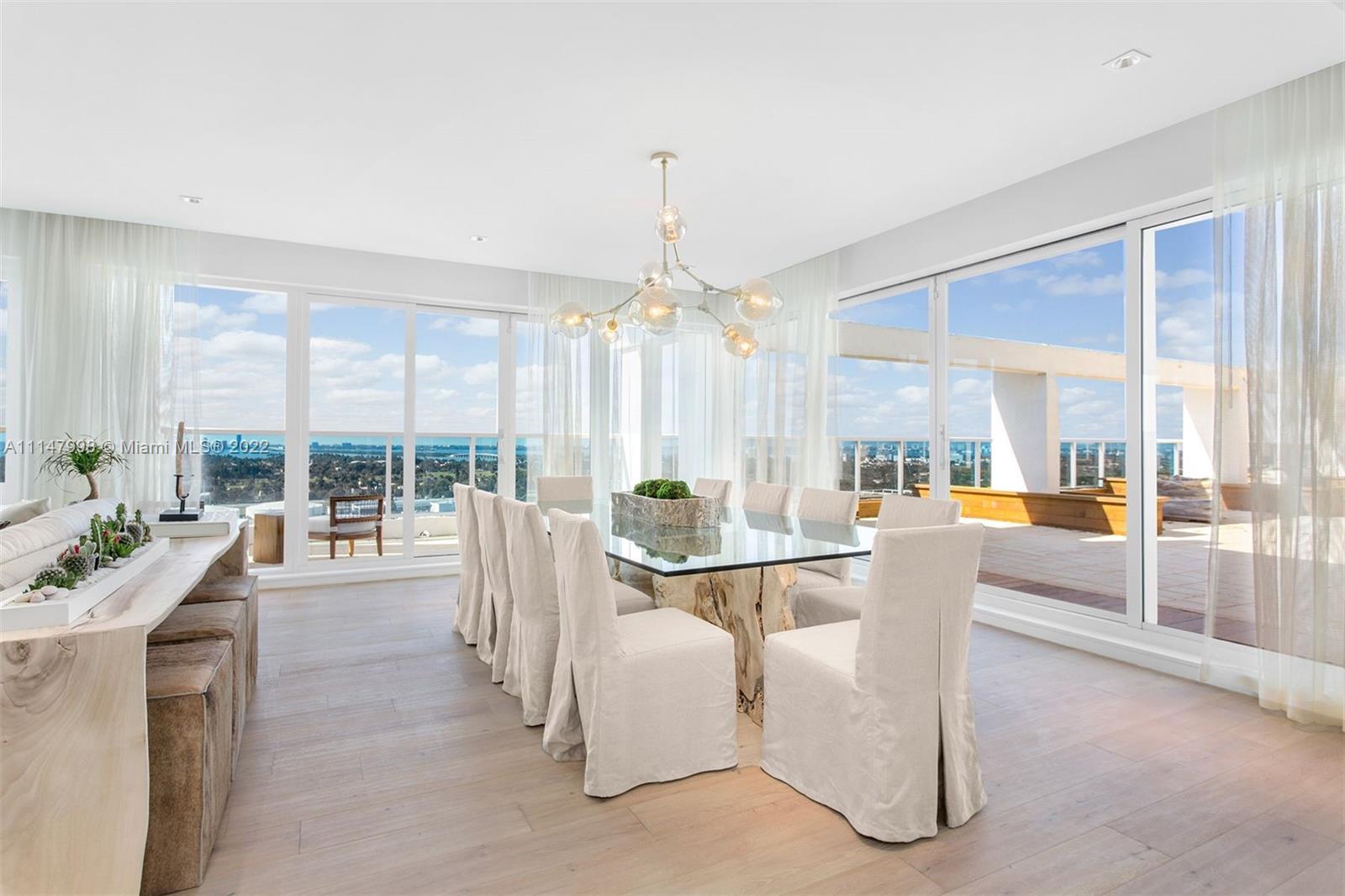 Situated on the top penthouse floor of 1 Hotel & Homes South Beach, this one of a kind penthouse boasts 4 beds, 3.5 baths with over 5,185sf of open spaces and an overabundance of indoor/outdoor entertainment living. The main living space opens to an ultra private, expansive 1,907sf serene and lush terrace featuring a private Jacuzzi, outdoor shower, covered dining, and custom seating surrounded by tropical greenery overlooking the Miami Skyline. The master bedroom features a walk-in closet and resort-like bathroom with a large sliding door leading to the balcony. Services include a private fully-staffed residence lobby, personal concierge, 4 pools, 4 restaurants, 3 bars, 14,000sf gym, Bamford spa, hair salon, Soul Cycle, children's play area, valet attendants and chauffeured house cars.