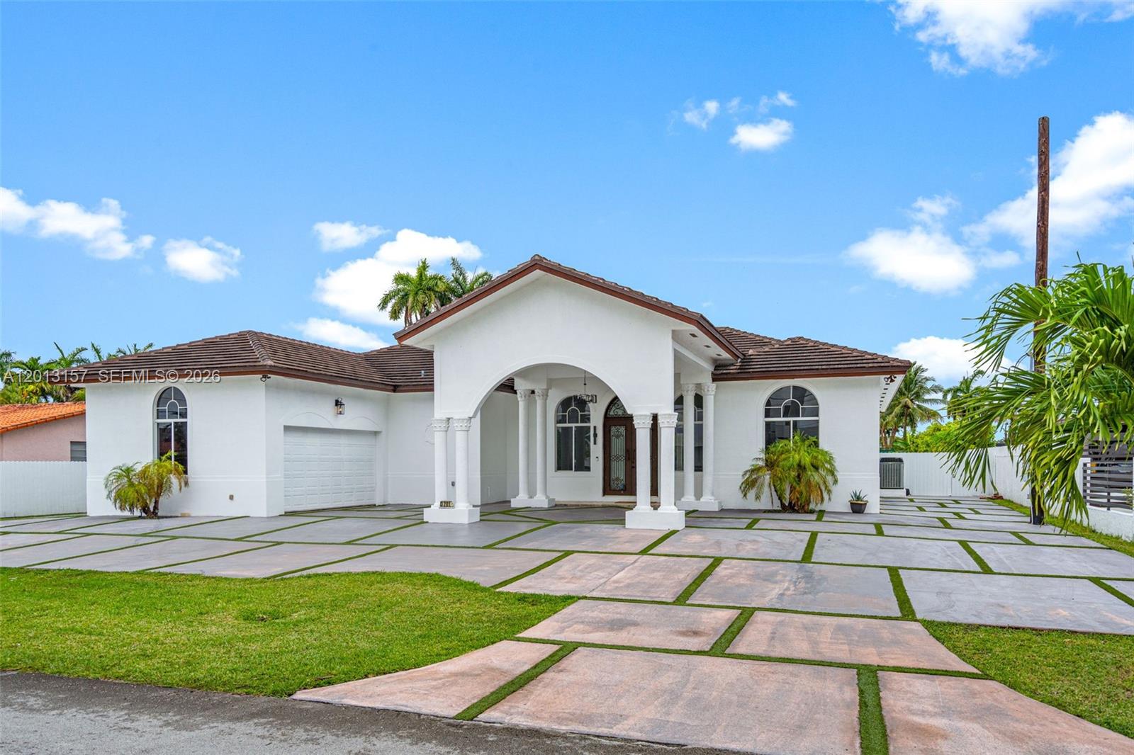 Stunning luxury residence in Miami featuring 5 bedrooms and 3.5 bathrooms. Designed with an expansive open-concept layout, this home is filled with abundant natural light and refined elegance throughout. The newly renovated gourmet kitchen showcases high-end stainless steel appliances and modern finishes. Situated on an oversized lot, the private backyard is a true oasis with a sparkling pool, perfect for upscale entertaining. A grand circular driveway enhances the home’s impressive curb appeal and provides ample parking. Don’t miss out on this unique estate! NO HOA.