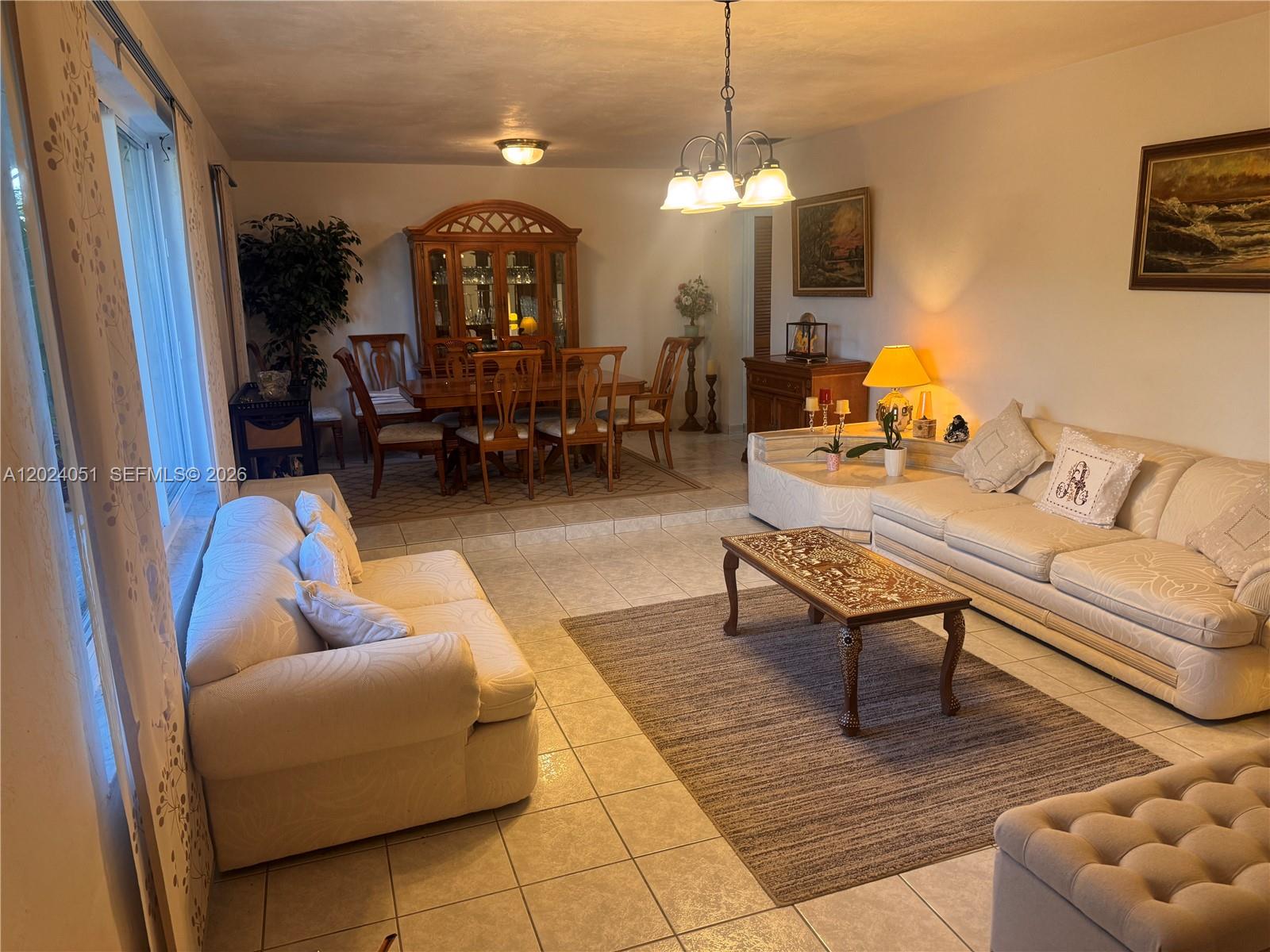 Welcome to Saga Bay living! This spacious 4-bedroom, 2-bath home offers nearly 2,000 sq ft of living space on an oversized lot with room for a pool. Featuring a functional one-story layout, tile flooring throughout, family room, Florida room, circular driveway, and 2-car garage, this home is ideal for families or investors alike. Located just minutes from Saga Bay Park, shopping, dining, and top commuter routes, this property combines comfort, convenience, and long-term value. Priced below market value, this home presents an excellent opportunity for instant equity and future appreciation in one of Cutler Bay’s most established communities. Don’t miss your chance to own in sought-after Saga Bay!