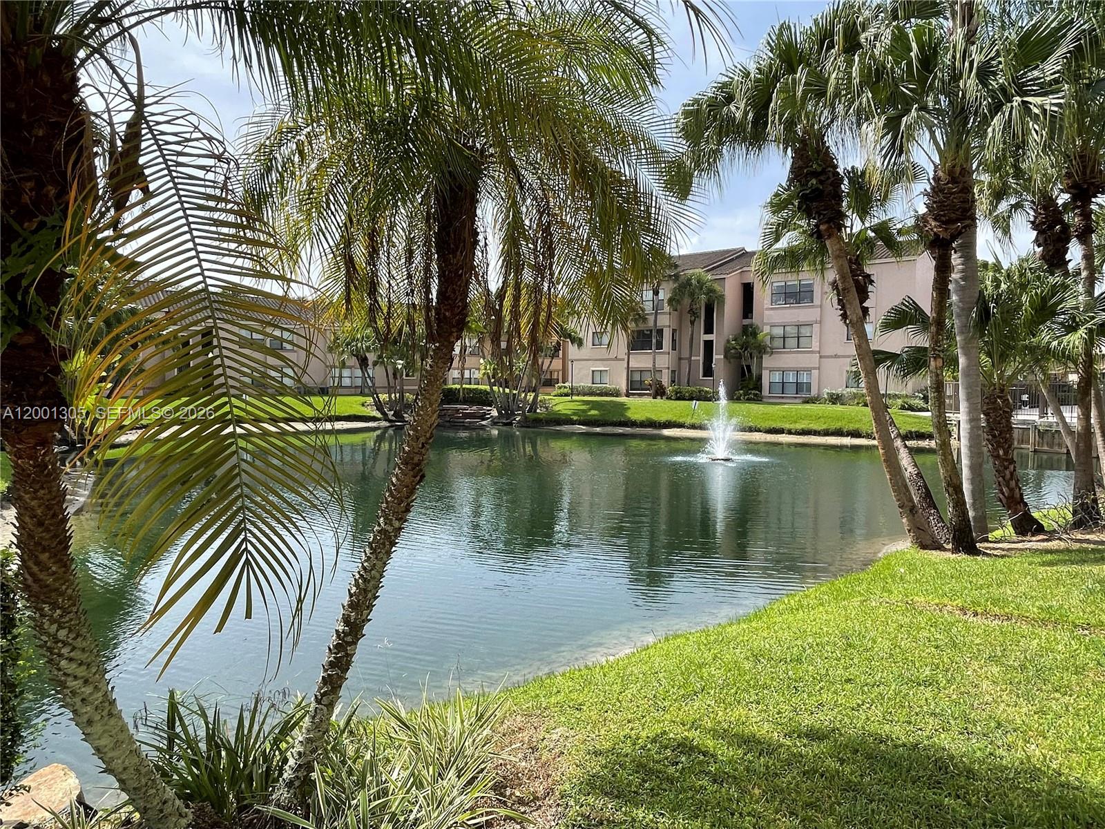 Awesome ground floor corner unit with lots of natural light. Unbeatable location.  1bedr+1baths 805 sqf. Renewed kitchen granite countertop/sink/faucet/backsplash, full size washer & dryer inside, ceiling fans in bedrooms, light fixtures, blinds on every window. Tankless water heater, lots of storage space.  Beautiful community with inner lake, pool, jacuzzi, gym, club house. Great location in Davie close to universities, restaurantes, highway, shops, banks, supermarket. Tenant occupied: currently rented until 8/20/2026 paying $1,900/mo willing to renew. HOA monthly fee $507.61 Special Assessment $177.67 (monthly until Oct2026 only). :: Recorded video tour available ::