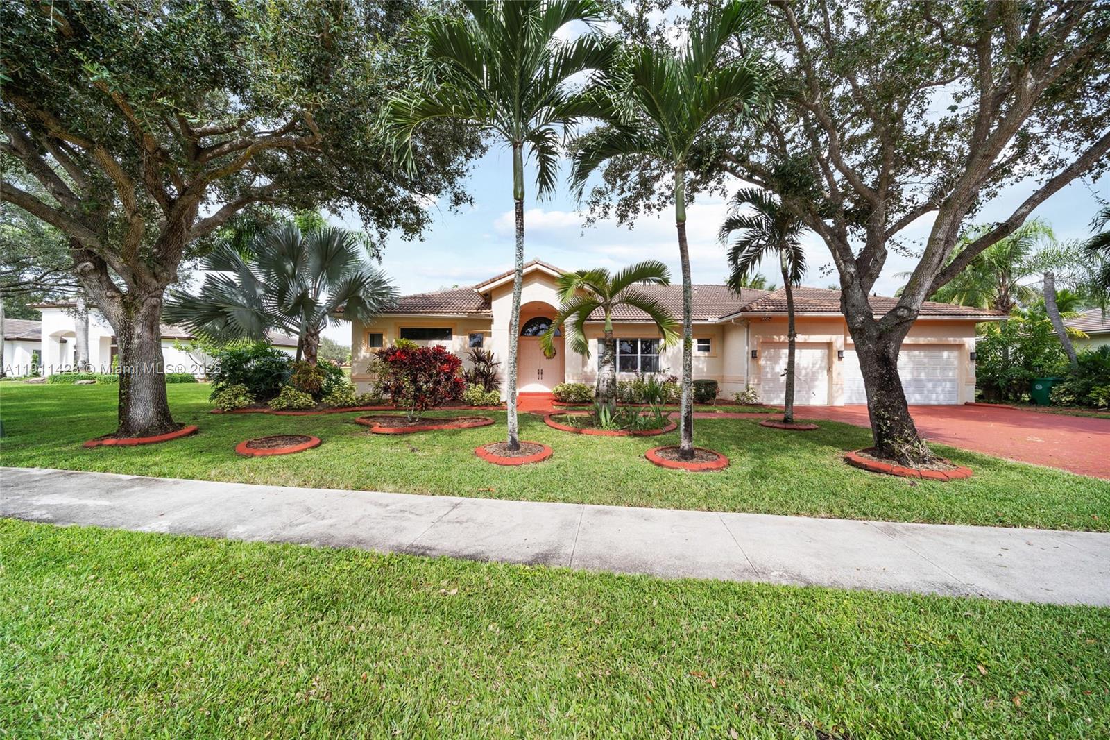 Discover your slice of paradise in the highly sought-after Imagination Farms of Davie, Florida! This stunning 4-bedroom, 3-bathroom Cambridge Model boasts over 3/4 of an acre of land, featuring breathtaking lake views that you can enjoy while floating in your beautiful pool. The property includes a garage conversion that adds a fifth bedroom and bath, perfect for accommodating guests or transforming into an office for the remote entrepreneur. Located in a secure gated community, you can rest easy knowing your family is safe and sound. Don’t miss out on this incredible opportunity, come see this property today before it’s gone!