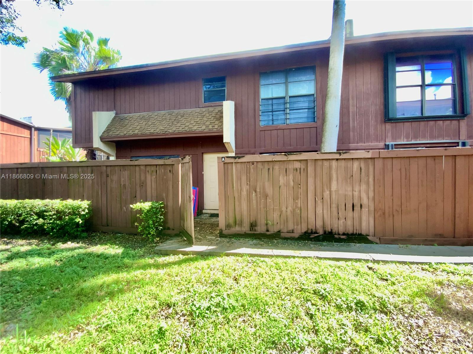 Investor and flipper special! This spacious 2 bed, 2.5 bath Snapper Village townhome offers 1,330 SF of living space plus private wrap-around patio. A complete renovation opportunity, the property is in original condition & ready for a full update—kitchen, bathrooms, flooring, & upstairs all await your vision. The functional layout features a large living room opening to the patio, dining area connected to the kitchen, & 2 upstairs bedrooms each with its own bath, including a primary with private balcony. Offered at an excellent price point by a motivated seller, this home is ideal for those looking to customize and add value in a guard-gated community with resort-style amenities: pool, tennis courts, clubhouse, & 24 hr security. Maintenance includes cable, insurance, water, roof, & more.