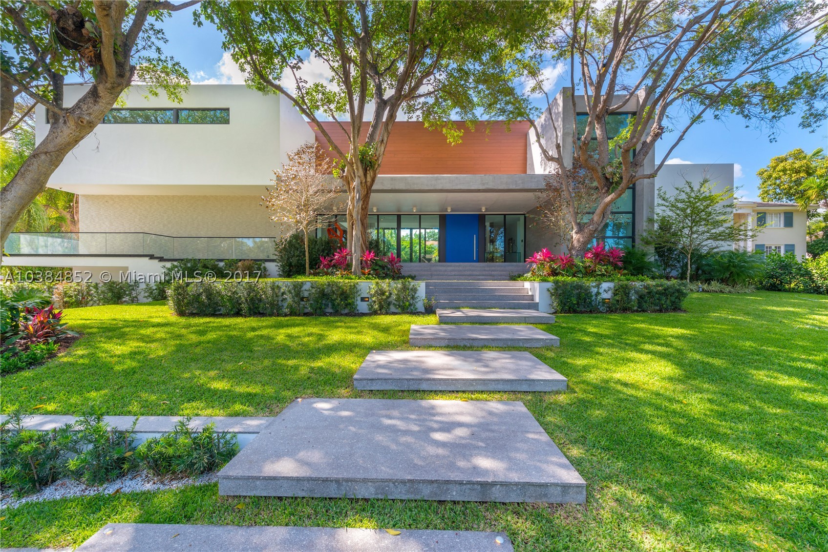 Designed with the art collector in mind, this .70-acre “smart” estate integrates the tropical landscaping of Coconut Grove with a modern architectural design that curates an environment where one can live an exceptional lifestyle. With 24-foot ceilings, floor-to-ceiling glass windows, stainless steel state-of-the-art appliances, marble/wood flooring throughout, a 10ft wine cellar, an infinity edge pool and summer kitchen, and much more this estate sets the standard in luxury living.