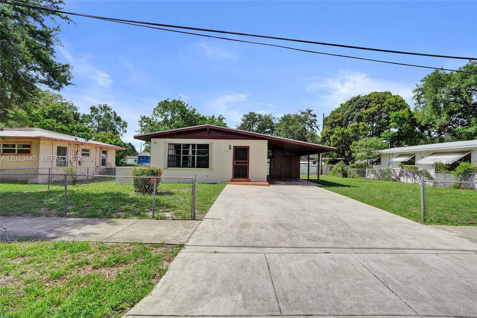 Fantastic property for end user or investor. 
Super area, great lot, room for expansion. Perfect home for first home buyers, or investors. 
New accordion hurricane shutters, roof is approx 10 years old, good condition. Original terrazzo flooring and ceramic tile. Vaulted living room/dining room ceiling.  New fixtures in the bathroom. New electrical box, outside storage and laundry hookup, carport and additional parking in the driveway, space for multiple cars.  Sold as is. Text listing agent for additional info and appointments.
Investors please note, zero inspection days, Due diligence can be done before offer.  Property is vacant.