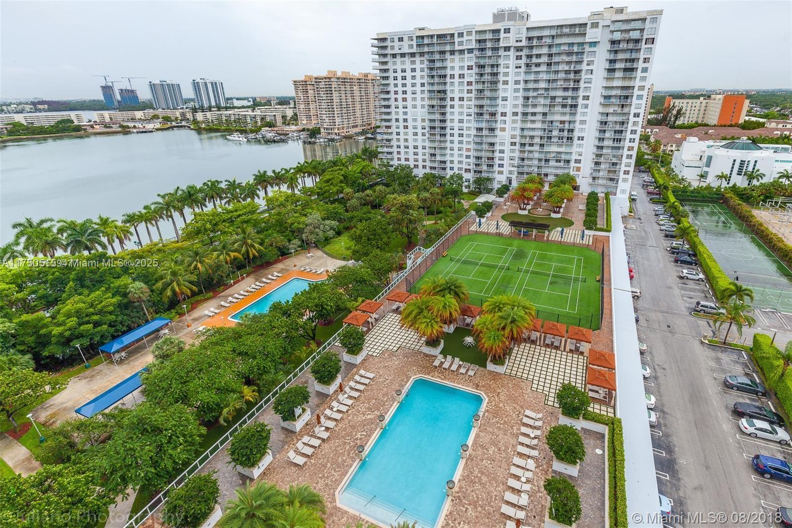 Beautiful spacious 1 bedroom 1.5 bathroom condo in Admirals Port. This unit offers a renovated kitchen and 2 renovated bathrooms, tile and wooden floor throughout! Located in the heart of Aventura, close to two international airports, the beach, fine dining, world class shopping, and so much more. Walk to houses of worship. Guard gated community, two swimming pools, fitness center, tennis courts, bbq area. Serene Maule Lake is right across the street. Enjoy all of great new amenities in the complex, remodeled swimming pool, mini golf, BBQ area, 2 tennis Courts and fitness center. Aventura Mall is close by, minutes to the Beach, Fresh market in walking distance. Great Aventura schools, close to everything
