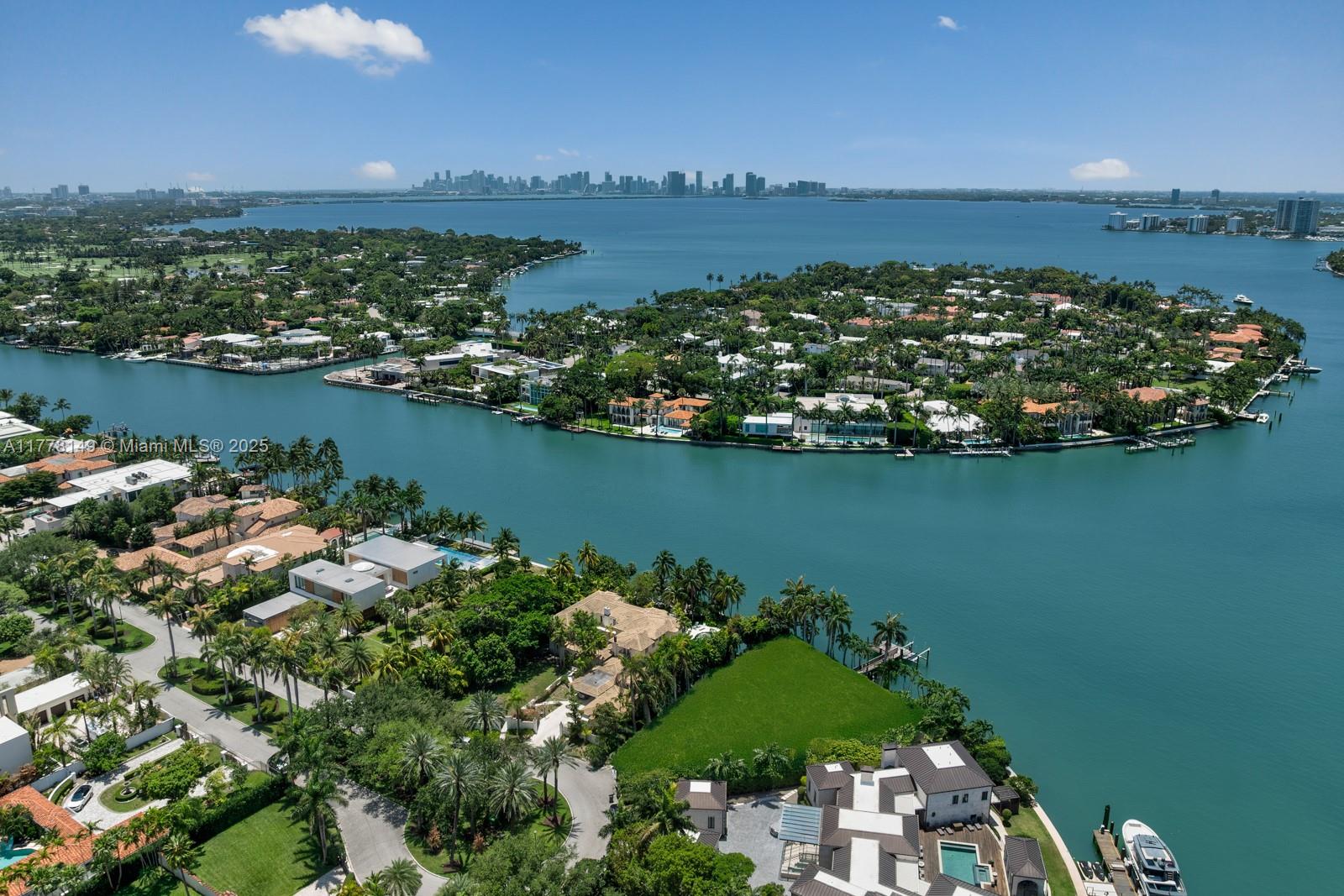 Experience waterfront luxury on this rare 20,052 sq ft pie-shaped lot boasting 170 feet of prime waterfront with sweeping bay views. Perfectly positioned at the point of a quiet cul-de-sac on guard-gated Allison Island, this property offers the island's most spectacular vistas and accommodates large yacht docking. Enjoy the exclusivity of this intimate community of only 50 waterfront homes while being conveniently located between South Beach, Sunset Harbour and Bal Harbour's finest dining and shopping. Breathtaking western sunsets over the wide bay complete this peaceful sanctuary. An exceptional canvas to build your dream estate.