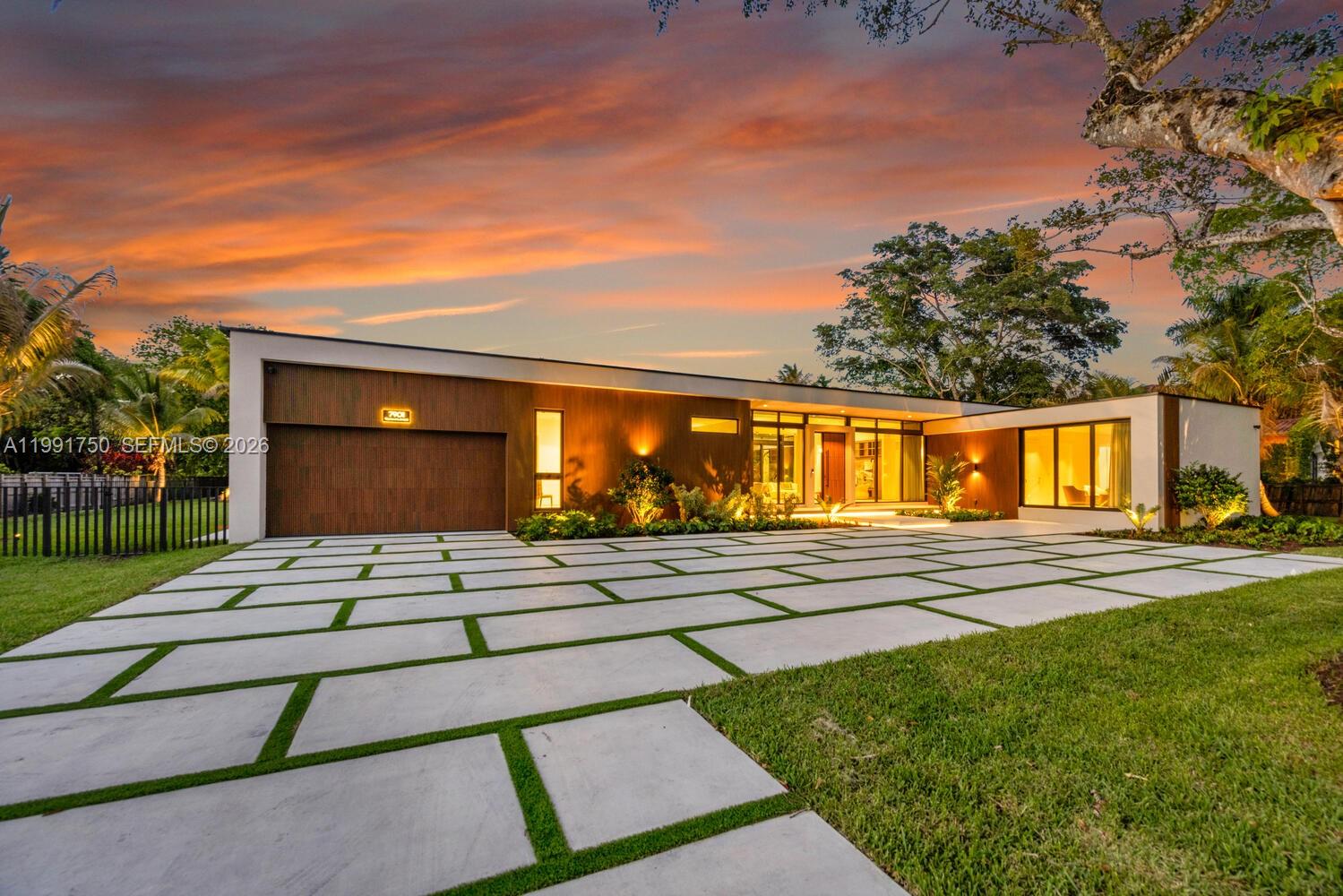 Introducing Casa Pinecrest, a striking modern estate in one of Pinecrest’s most coveted neighborhoods, set behind gates on a sprawling 37,853 sqft lot. Designed for elevated living and effortless entertaining, this residence offers a 6 bedroom, 6.5 bathroom main home plus a detached VIP suite and private gym, creating a true resort style compound with exceptional privacy.

Every detail reflects exceptional craftsmanship, from custom millwork and museum finish baseboards to refined interior doors by MiaCucina. The main kitchen by Febal Casa is a showpiece, featuring Taj Mahal quartzite countertops, top of the line SubZero and Miele appliances, and an oversized pantry. A separate chef’s kitchen adds functionality, ideal for entertaining or catering.

Refined finishes continue throughout with 48x48 minimal white natural travertine flooring, expansive open living areas filled with natural light, and floor to ceiling glass enhancing the indoor outdoor flow. A statement powder room in emerald green stone and a spa inspired primary bath in Islimm Geo Crema complete the design. 

Outdoor living impresses with a heated pool, spa, summer kitchen, and expansive entertaining spaces. A full Control4 smart home system, electric blackout curtains, impact windows and doors, and a 2 car garage complete this turnkey estate in the heart of Pinecrest, offering a rare blend of design, scale, and functionality for today’s luxury buyer, with seamless indoor outdoor living throughout.