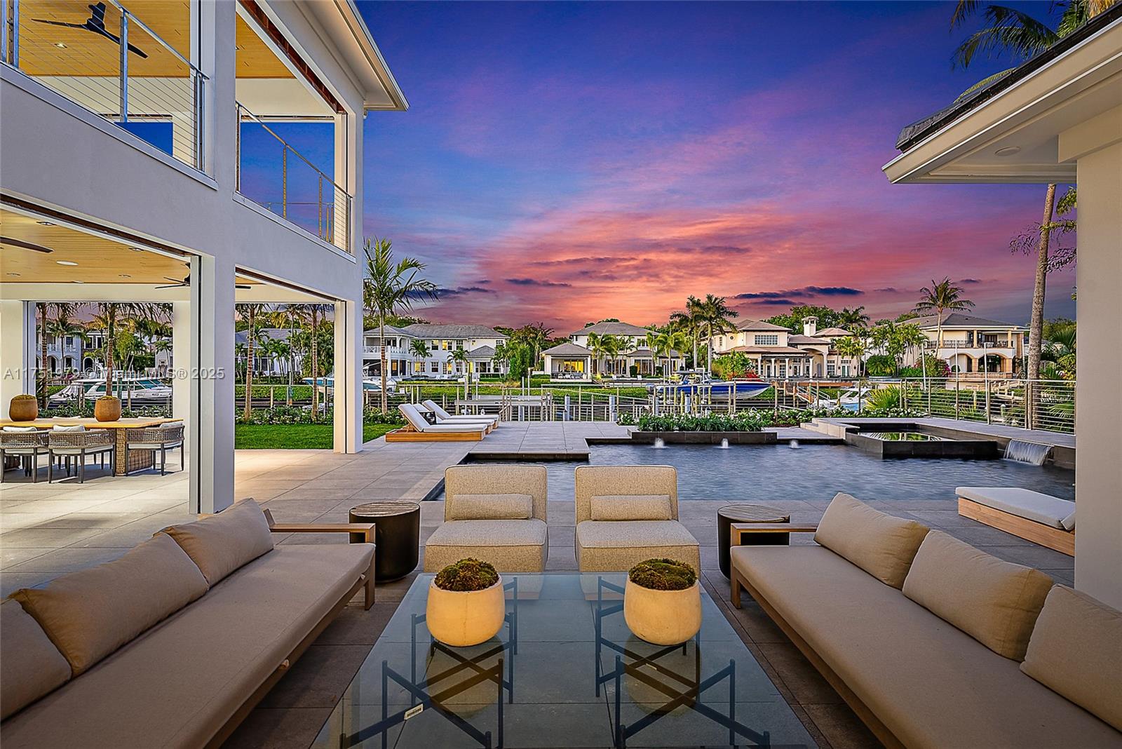 Fresh from a spectacular 2025 transformation, this ultra-high-end contemporary residence in Admirals Cove is a masterpiece of modern luxury. Every detail has been meticulously curated, featuring exquisite finishes throughout. The stunning Downsview kitchen is a showstopper, boasting an illuminated Onyx island, top-tier Wolf, Miele, and Sub-Zero appliances, and custom cabinetry.
The lavish primary suite is a private retreat, complete with dual spa-like bathrooms and expansive boutique-style closets. Two additional en-suite bedrooms/flex spaces offer versatility and sophistication, each with walk-in closets. Step outside to an entertainer's dream—an expansive lanai with a full summer kitchen, seamlessly blending indoor and outdoor living.