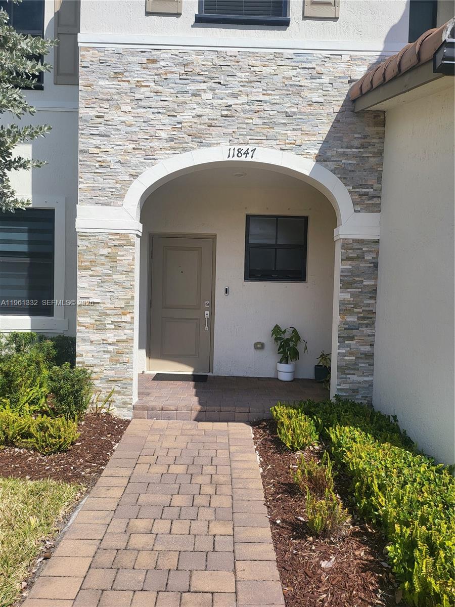 Welcome to this beautifully maintained 4-year-old home located in the desirable community of Villa at Corisca. This open-concept layout features 3 spacious bedrooms and 2 full bathrooms. Tile flooring enhances the main living areas on the first floor, while the upstairs bedrooms offer cozy carpeted floors. The kitchen is equipped with stainless steel appliances and ample storage. Parking is conveniently located directly in front of the unit. Ideally located near shopping, restaurants, and nearby schools. **Tenant occupied—please do not disturb tenants. Showings by appointment only. Lease expires July 2026**.