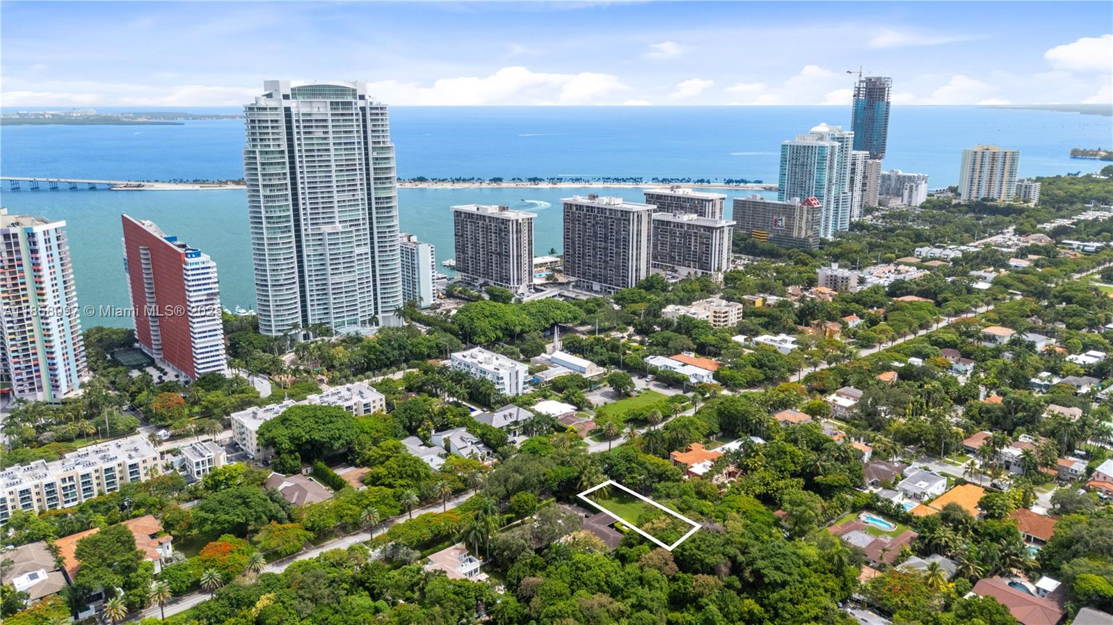 READY TO BUILD in the heart of historic Brickell. Rare opportunity to acquire a 7,540 SF residential vacant lot on prestigious South Miami Ave, offered with fully approved plans for a spectacular 4-level modern estate totaling 9,321 SF of construction. Designed for elevated living, the residence features approximately 5,916 SF under A/C with 6 bedrooms, 6.5 bathrooms, a study, library, and private elevator servicing every level. The home is envisioned with expansive indoor-outdoor living, generous terraces, a rooftop oasis with pool and summer kitchen, and a 3,405 SF basement with a private 5-car garage. Proposed layout includes elegant living and dining spaces, a European-style kitchen, family room, and well-appointed guest accommodations. A truly exceptional opportunity to bring a refined architectural vision to life in one of Miami’s most coveted and central locations.