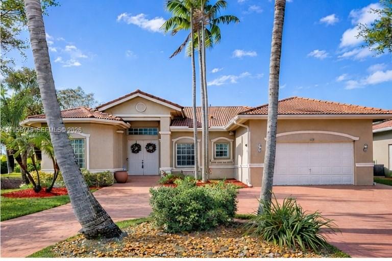 Welcome to refined South Florida living in this elegant 5-bedroom, 3-bath residence located in the prestigious Lago Plantation community. Designed for both everyday comfort and effortless entertaining, this home offers a thoughtful layout with expansive living areas ideal for families, hosting guests, and flexible work-from-home living.

The generous floor plan provides multiple gathering spaces that flow seamlessly, creating an inviting atmosphere for entertaining or quiet evenings at home. Natural light fills the residence, enhancing the sense of openness and warmth throughout. The private bedroom layout offers comfort and functionality, making it well-suited for guests or multigenerational living. 

Back on the market at a newly reduced price, this property presents a rare opportunity to own in one of the area’s most desirable neighborhoods. Conveniently located near A-rated schools, premier shopping, dining, and Sawgrass Mills. Schedule your private showing today.