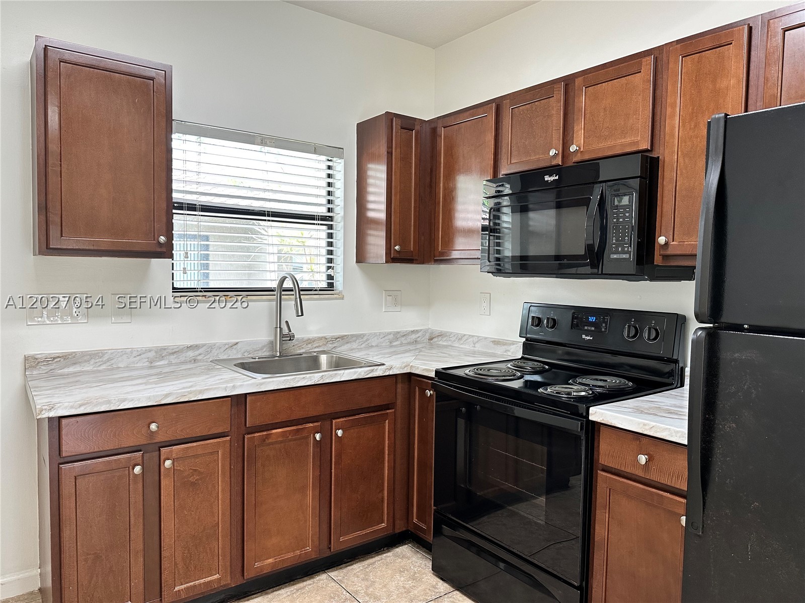 Beautiful, upgraded 2BD/1BA villas-style apartment in the highly desirable neighborhood of Lake Ridge, Fort Lauderdale! Unit features tile floors, newer appliances, brand new granite countertops, impact windows and doors & central AC. Bright, spacious with privacy & direct access to back garden yard area from unit. First floor. Handicap accessible. Includes 2 assigned parking spaces. Laundry on-site. Prime location, nestled in a quiet community with everything nearby such as Victoria Park, walking distance to Flagler Village, Holiday Park, Roller Rink, Tennis/Recreation Center, Las Olas, Downtown Fort Lauderdale. Under 5mins drive to Fort Lauderdale Beach & 15 mins from FTL airport. Also close to Galleria at Fort Lauderdale, spas, shops, and world-class restaurants. Near major highways such as A1A, US1, I-95 & more. Available now!