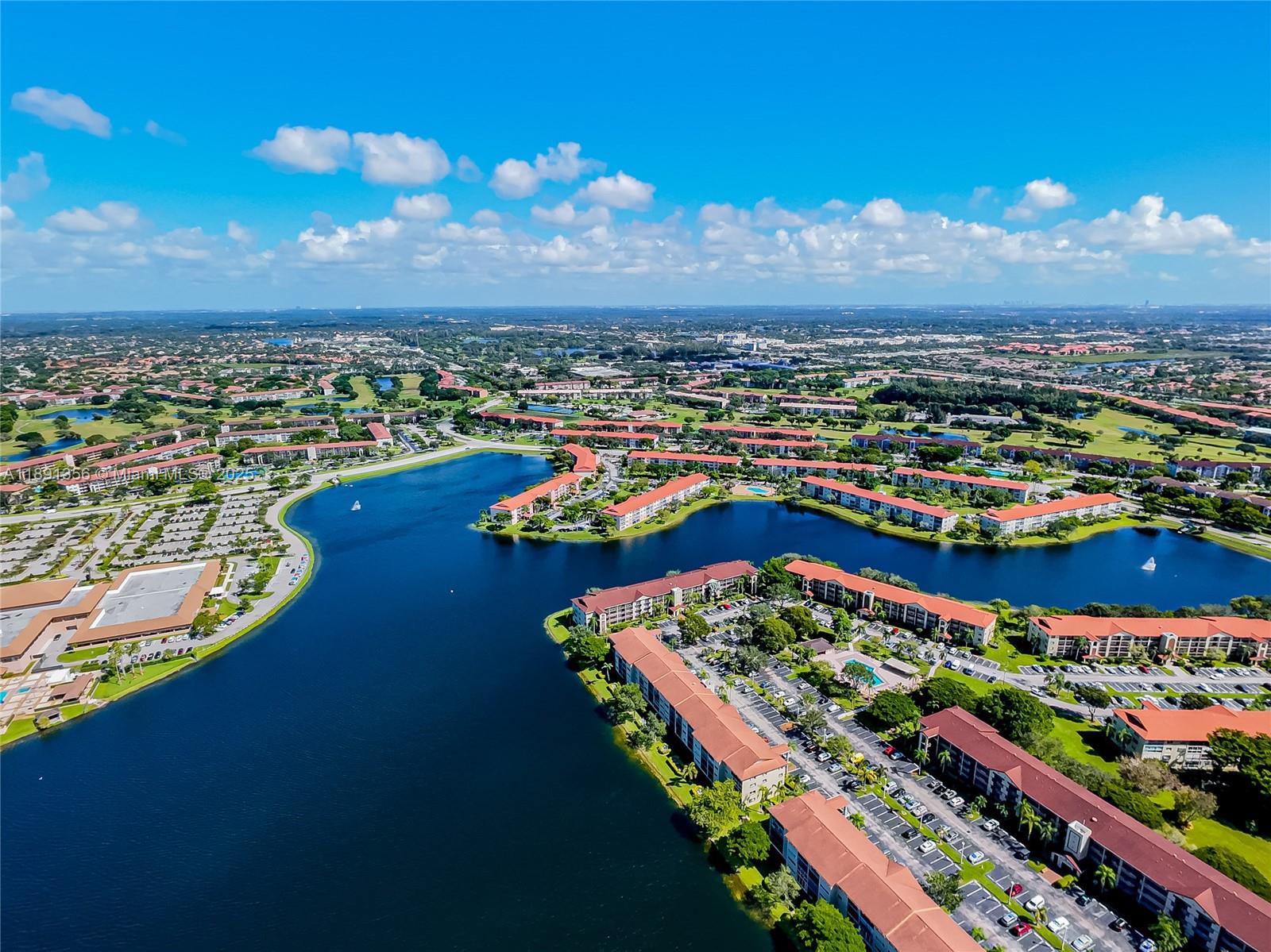 Beautifully first-floor condo in Century Village, a vibrant 55+ active adult community offering resort-style living. This 1 Bed /1.5 Bath unit features a functional layout with stunning lake and clubhouse views, perfect for peaceful mornings or entertaining guests. Enjoy the convenience of a washer and dryer inside the unit, along with newly installed impact windows that provide enhanced safety, energy efficiency, and quiet comfort. The home has been meticulously maintained and showcases tasteful upgrades throughout. Located in a prime spot within the community, you're just steps away from world class amenities including pools, fitness centers, walking trails, and social activities. Easy to show and ready for immediate occupancy this is the perfect place to enjoy the lifestyle you deserve.