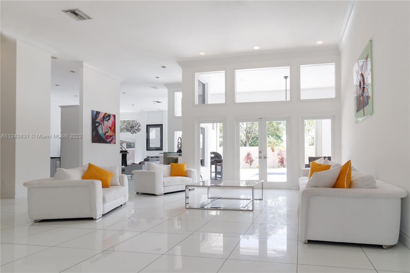 BEAUTIFUL & VERY BRIGHT SINGLE FAM HOME 5 BDRMS 5 BTHS. ON A CUL-THE-SAC  & OVERSIZE LOT. PROPERTY LOCATED AT THE PRESTIGIOUS & PRIVATE GATED "PLANTATION PALMS" COMMUNITY IN PLANTATION. THIS VERY SPACIOUS HOUSE WITH HIGH CELILINGS & SPLIT BEDRROMS FLOOR PLAN, OFFERS PLENTY OF PRIVACY TO THE MASTER BEDROOM. MASTER BATH RECENTELY RENOVATED WITH  QUARTZ TOPS IN HIS & HERS VANITY. WHITE PORCELAIN FLOORS IN THE MAIN AREAS. SEPARATE OFFICE, WITH CUSTOM CHERRY HARWOOD CABINETS, PERFECT TO WORK FROM HOME. VERY SPACIOUS KITCHEN, WITH GRANITE COUNTERTOPS, S.S. APPLIANCES, EAT IN KITCHEN AREA AND VERY SPACIOUS FAM.ROOM. BEAUTIFUL  OVERSIZE BACKYARD AND POOL, WITH SHADED AREAS IN PATIO, PERFECT FOR ENTERTAINING. ACCORDION SHUTTERS IN THE ENTIRE HOUSE. SEMI FURNISHED. NO ASSOCIATION APPROVAL NEEDED!