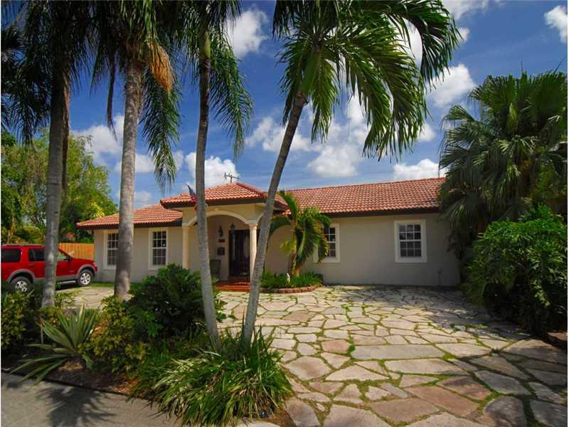 Beautifully updated 1-story home w/heated pool. Ceramic floors thru-out, new eat-in kitchen w/stainless steel appliances & granite countertops, new baths, laundry room has full-size washer & dryer, spacious family room, alarm & cameras, paved driveway for  5 cars, hurricane shutters, shed, gazebo & BBQ area. 4th bdrm is adjacent to home, used as office. Yard and pool maintenance included in rent! Enjoy living in an excellent location! This property is in NO financial distress. Available 9/15/2015.